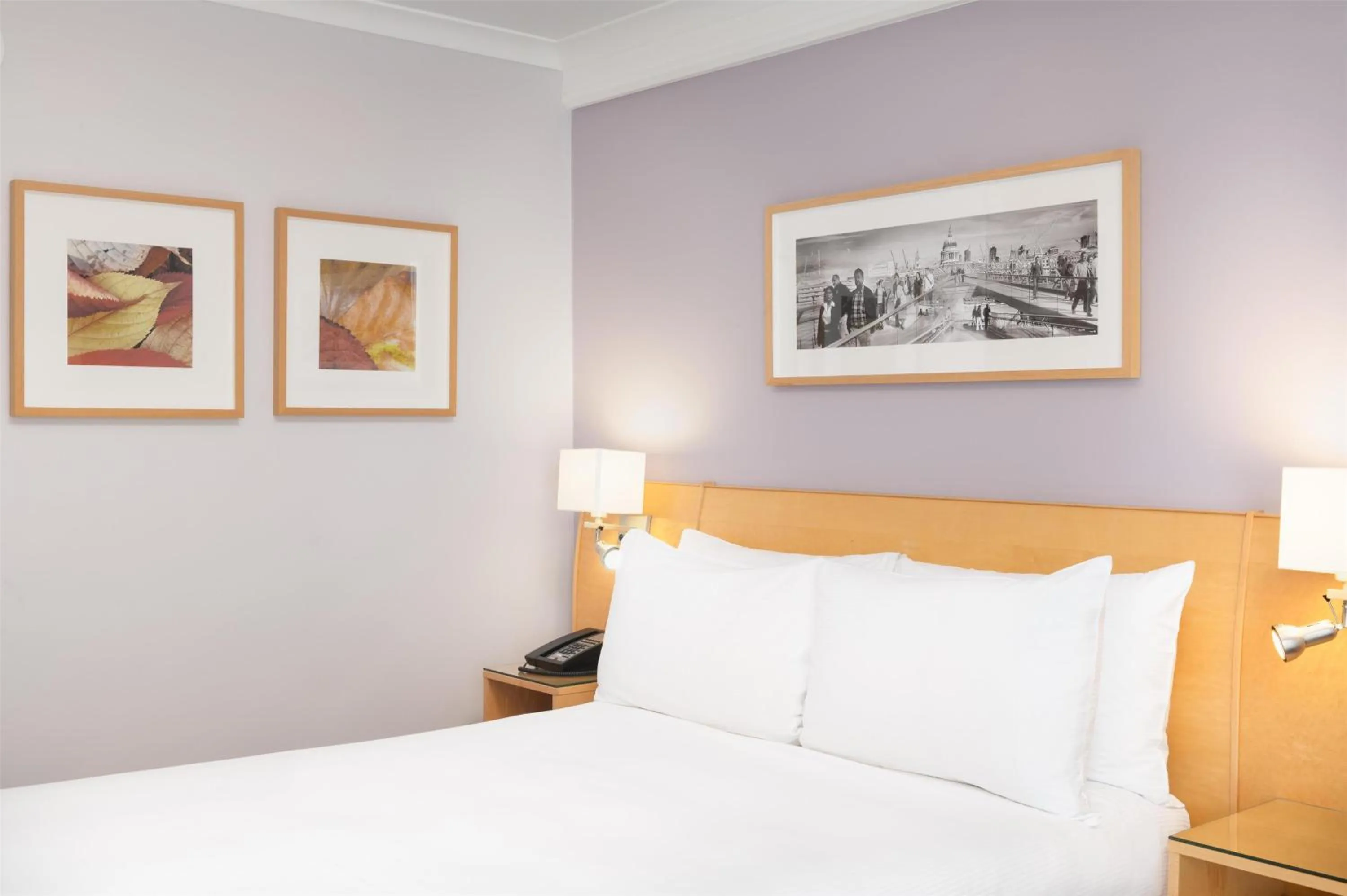 Bed in Hilton London Kensington Hotel