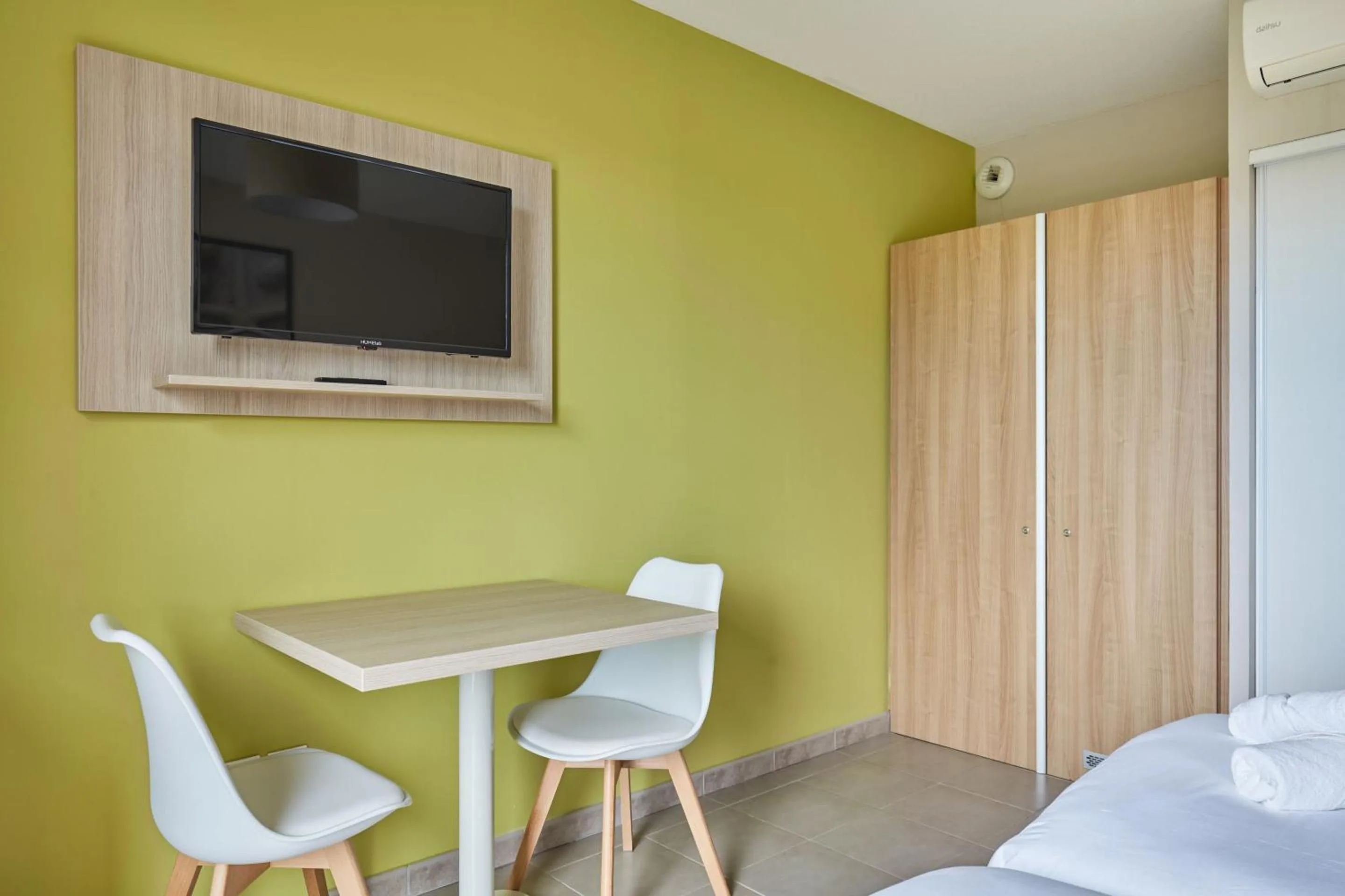 Seating area, Bed in Résidence Odalys Les Océanides