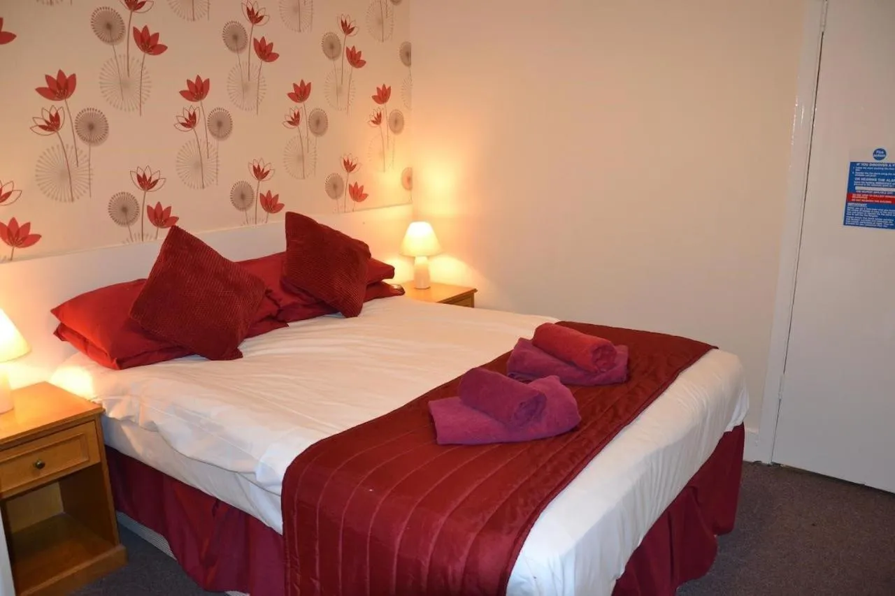 Bed in Chiswick Lodge Hotel