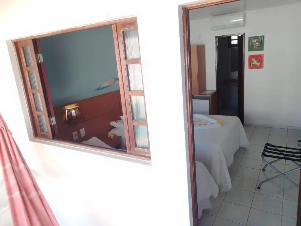 Photo of the whole room, Bed in Pousada Lua Azul