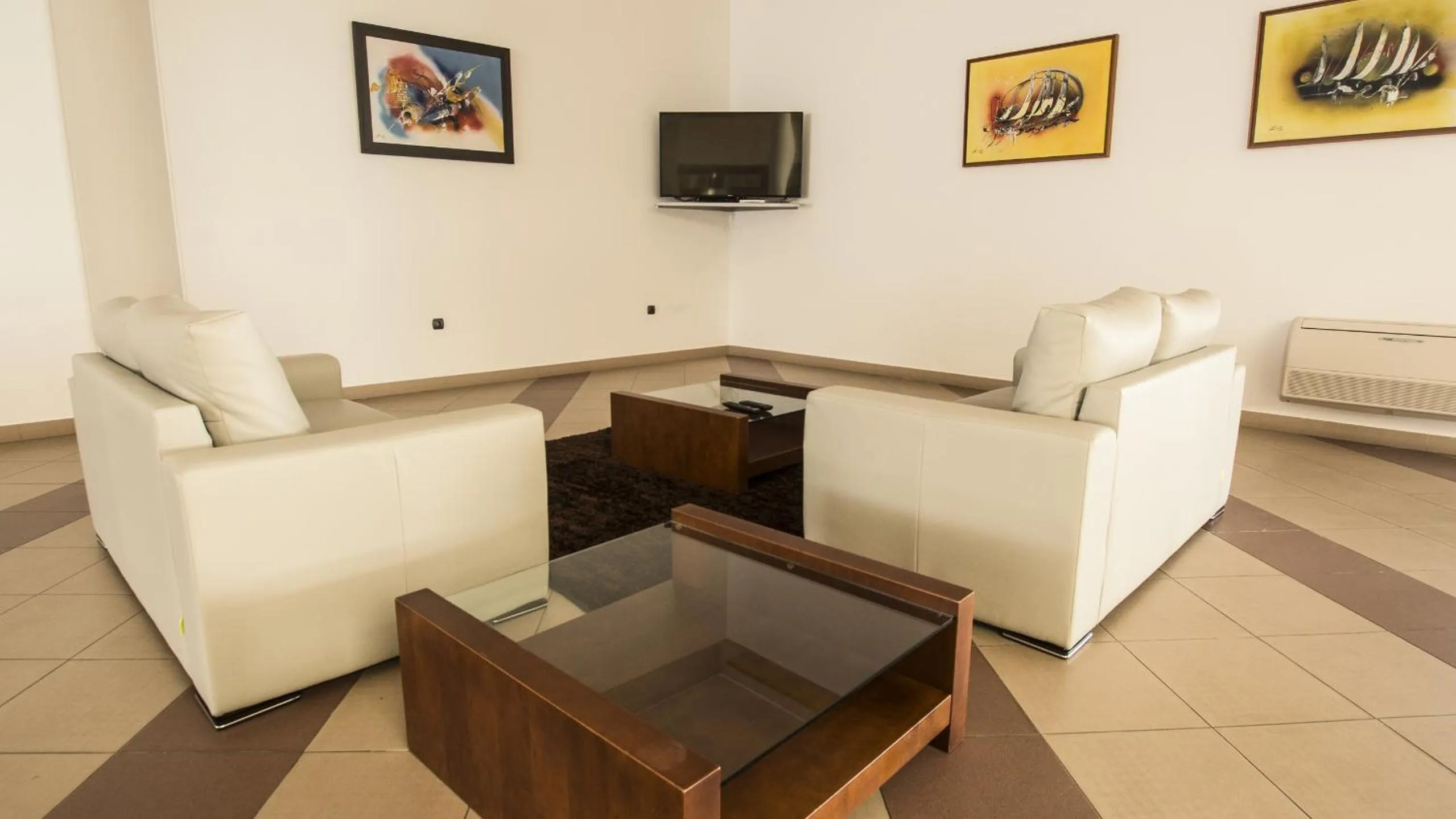 Communal lounge/ TV room in Hotel Santa Maria