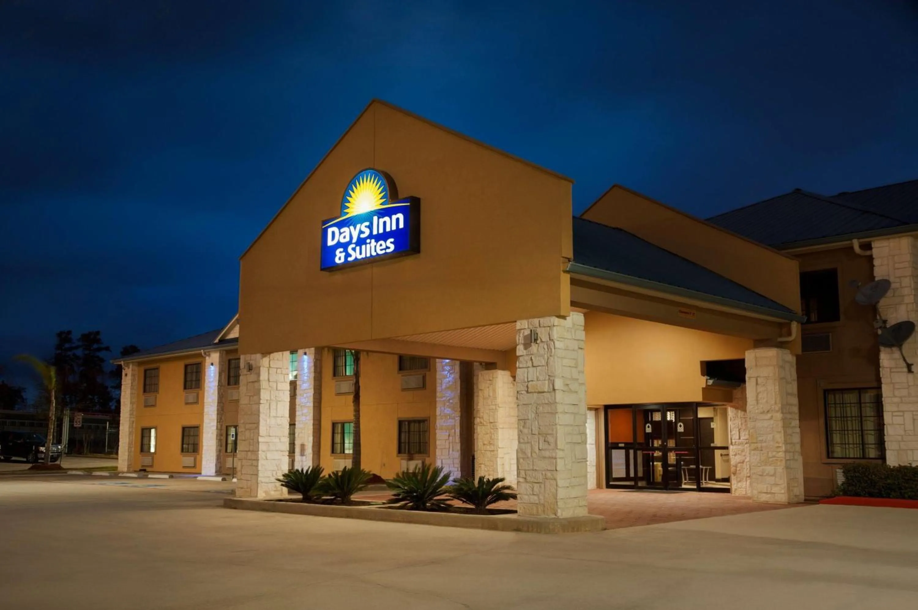 Property building in Days Inn & Suites by Wyndham Conroe North