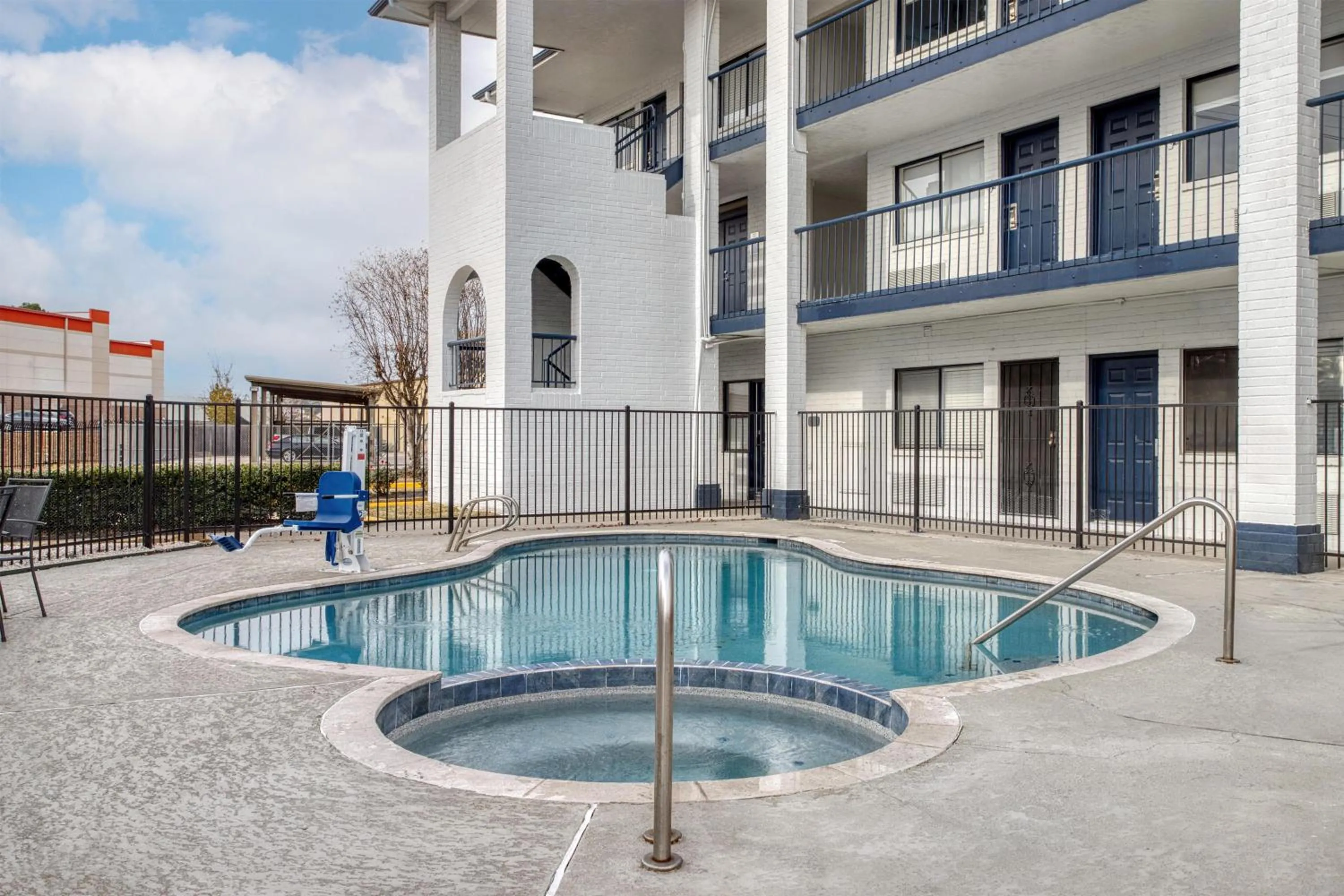 Pool view in SureStay Hotel by Best Western Spring North Houston