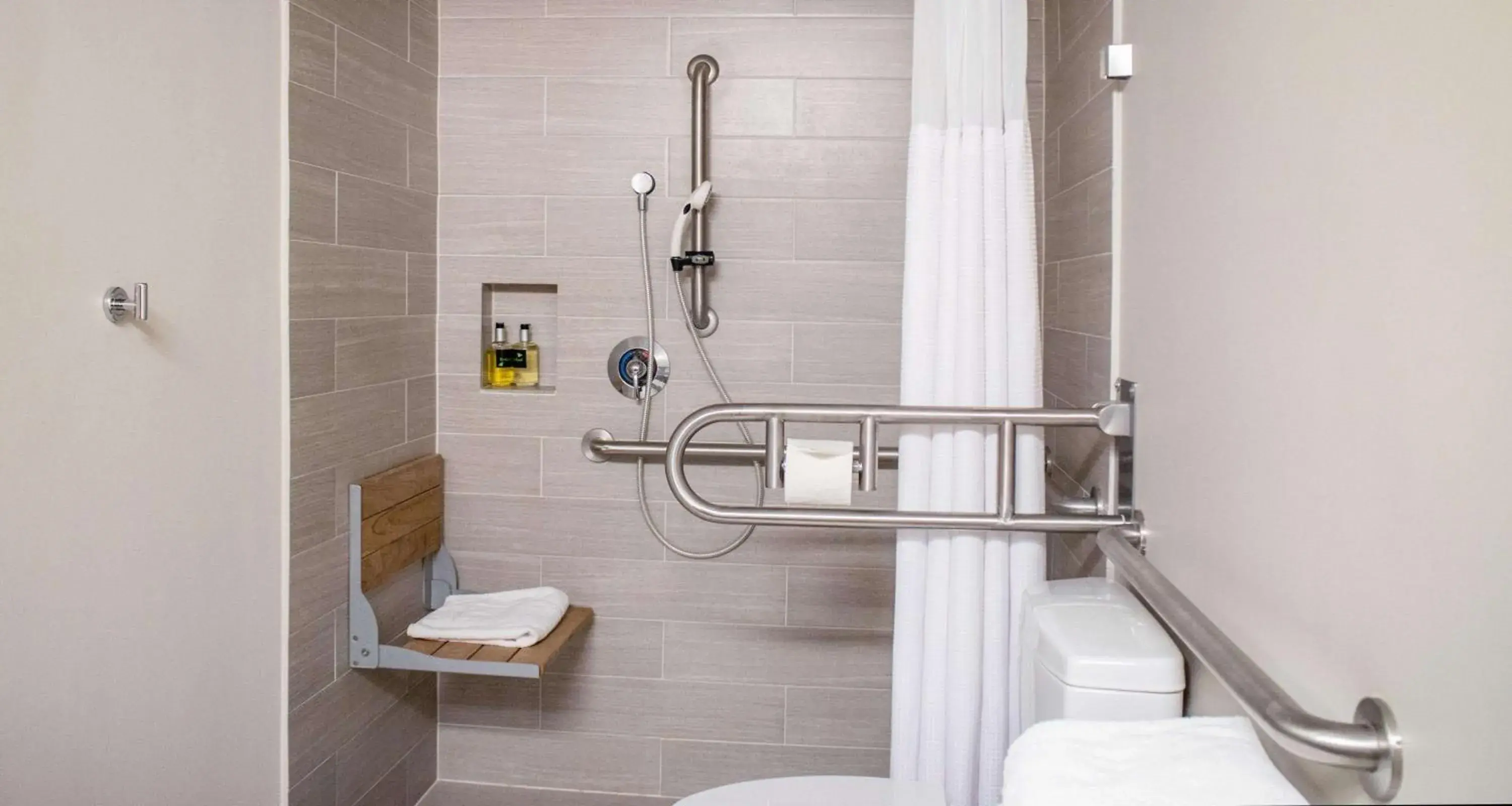 King Room with Roll-In Shower - Disability Access in The Rushmore Hotel & Suites; BW Premier Collection King Room with Roll-In Shower - Disability Access in The Rushmore Hotel & Suites; BW Premier Collection