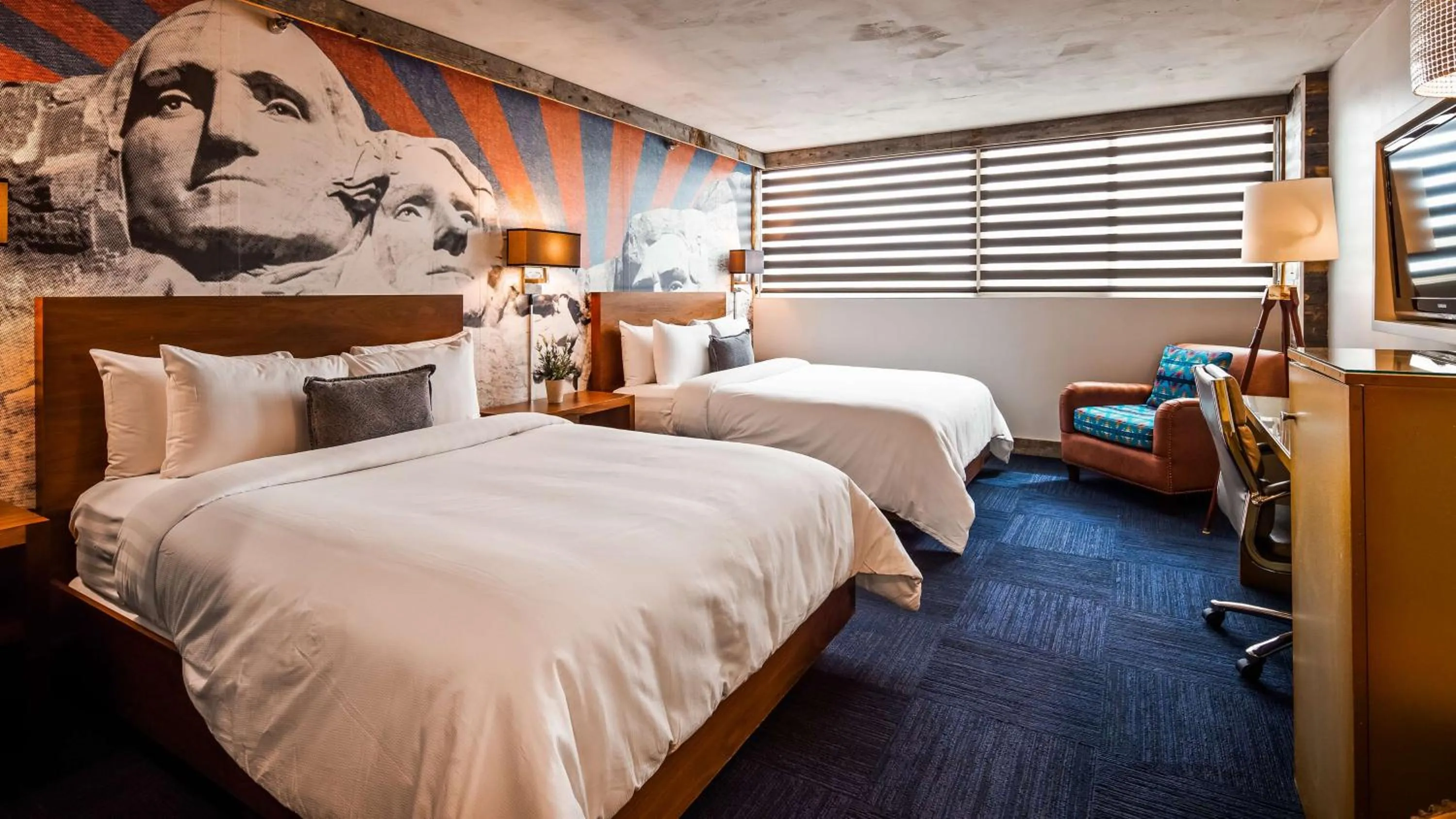 Photo of the whole room, Bed in The Rushmore Hotel & Suites; BW Premier Collection