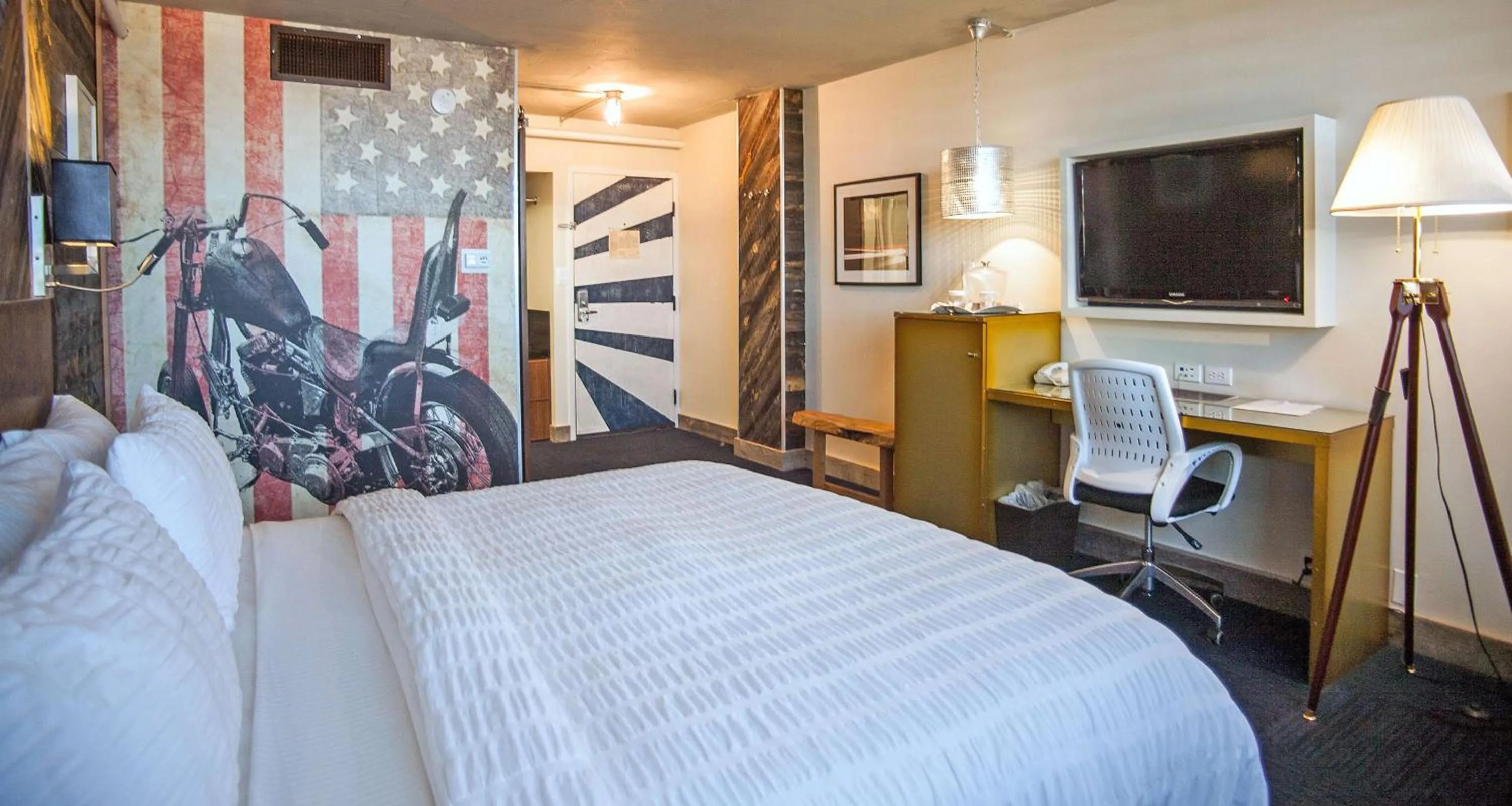 Photo of the whole room, Bed in The Rushmore Hotel & Suites; BW Premier Collection