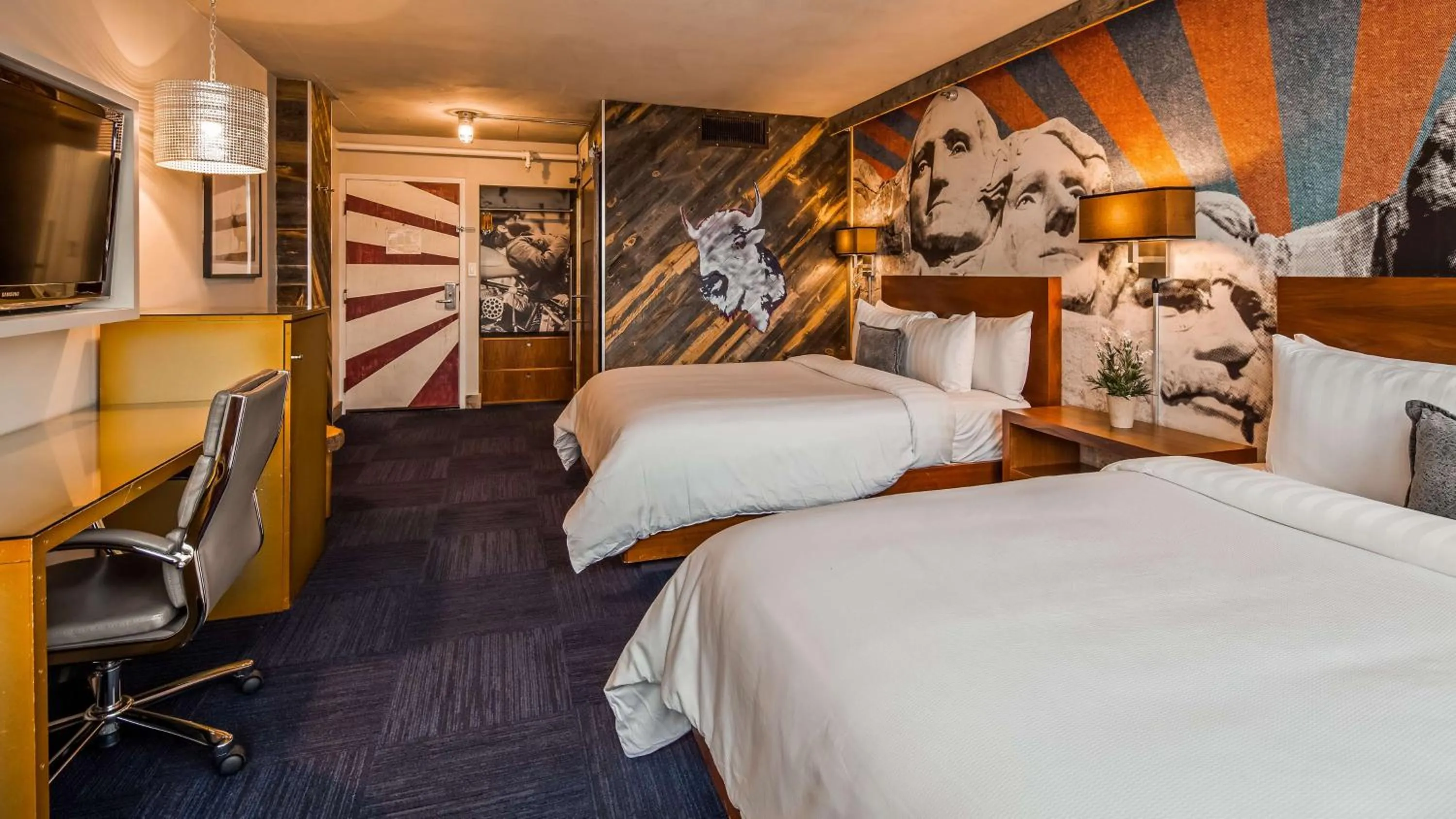 Photo of the whole room, Bed in The Rushmore Hotel & Suites; BW Premier Collection