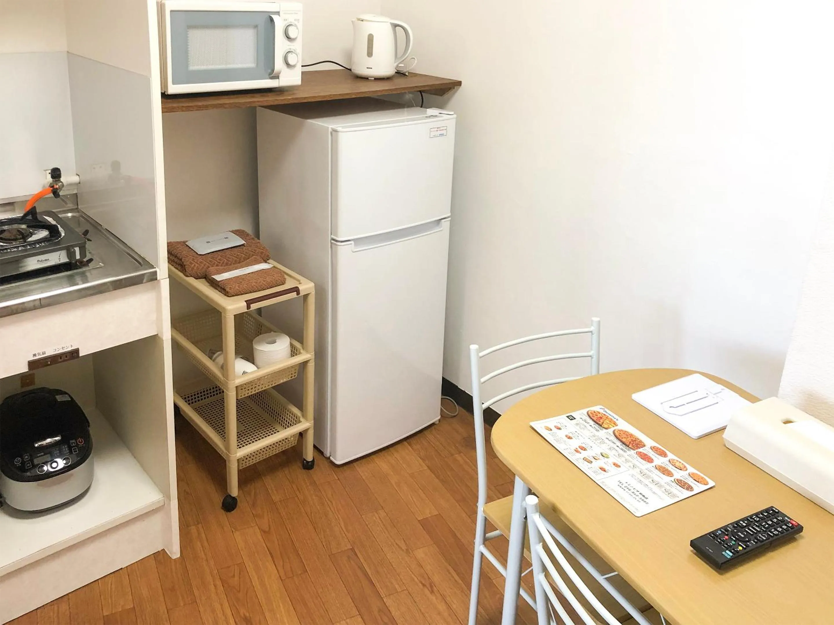 Kitchen or kitchenette in Sunset Hills Inn Naha