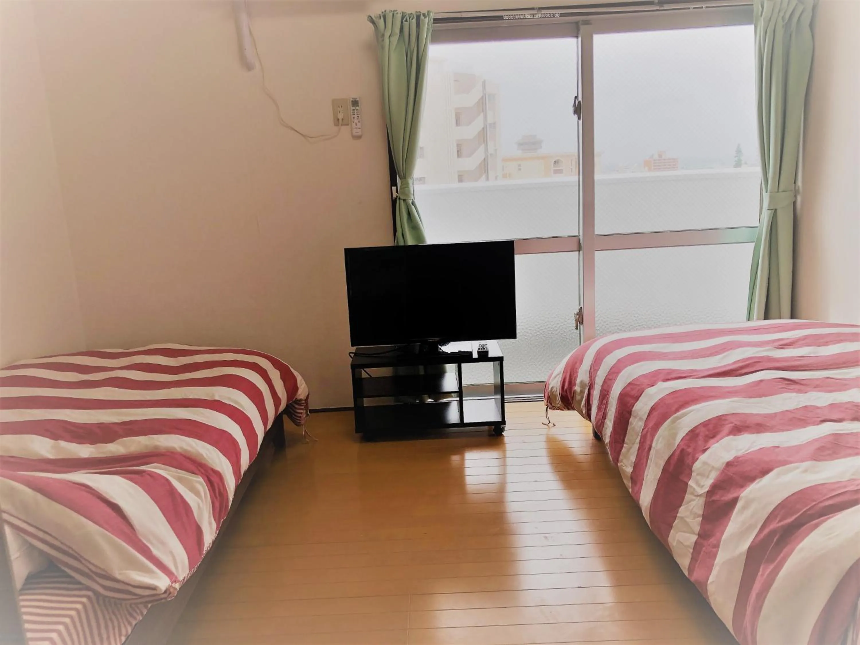 Photo of the whole room in Sunset Hills Inn Naha