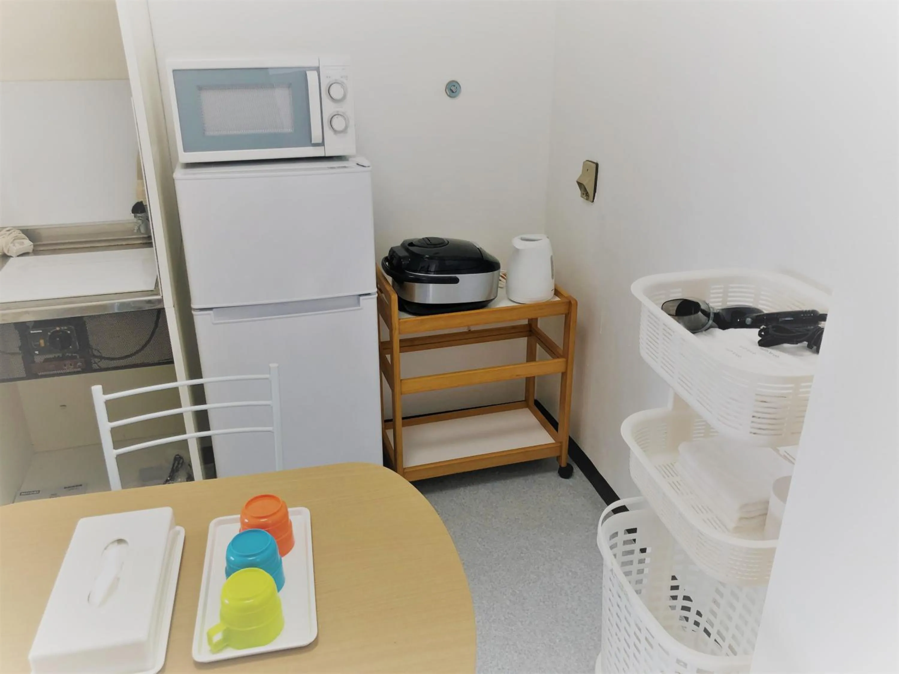 Kitchen or kitchenette in Sunset Hills Inn Naha