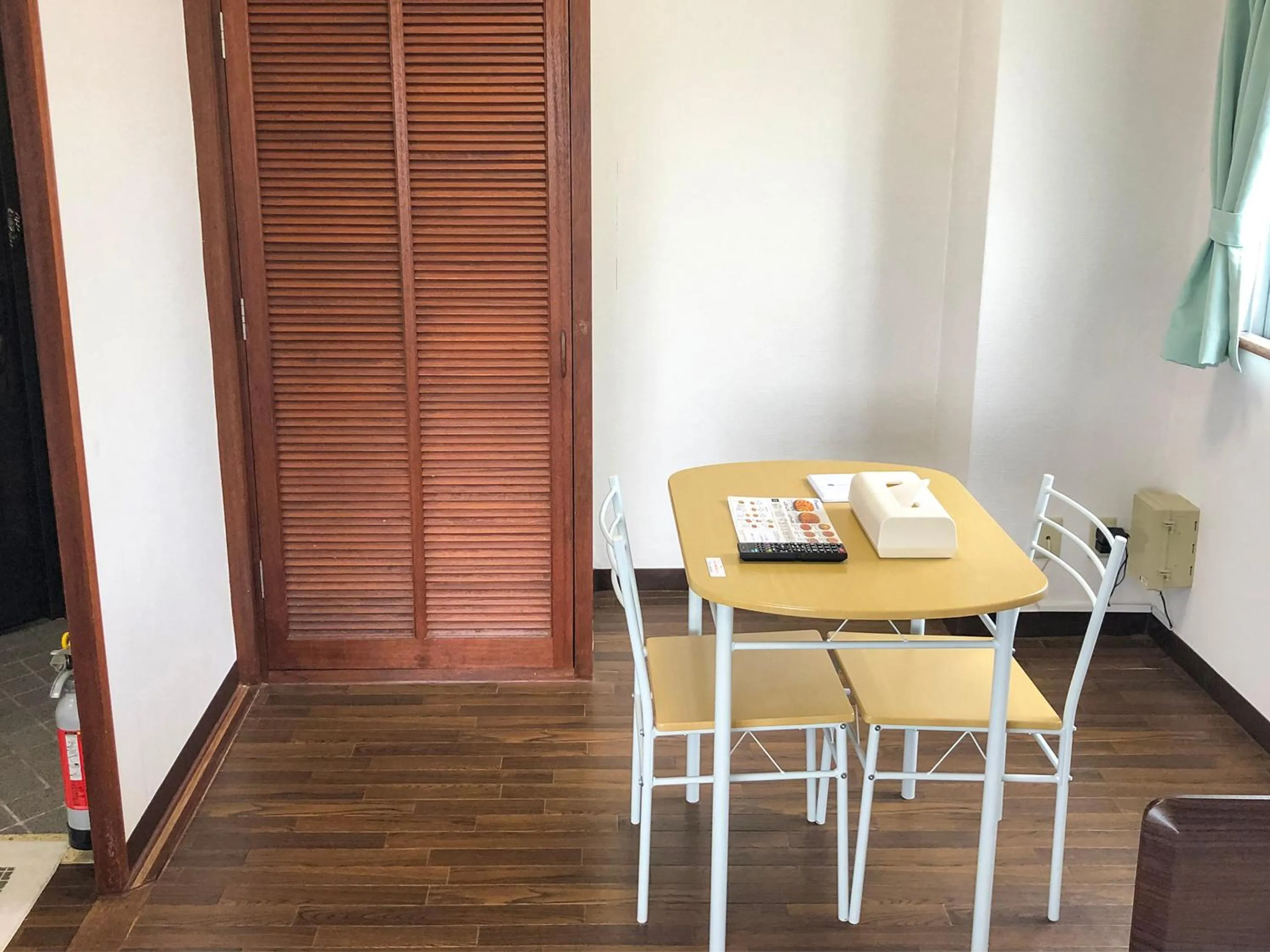 Dining area in Sunset Hills Inn Naha
