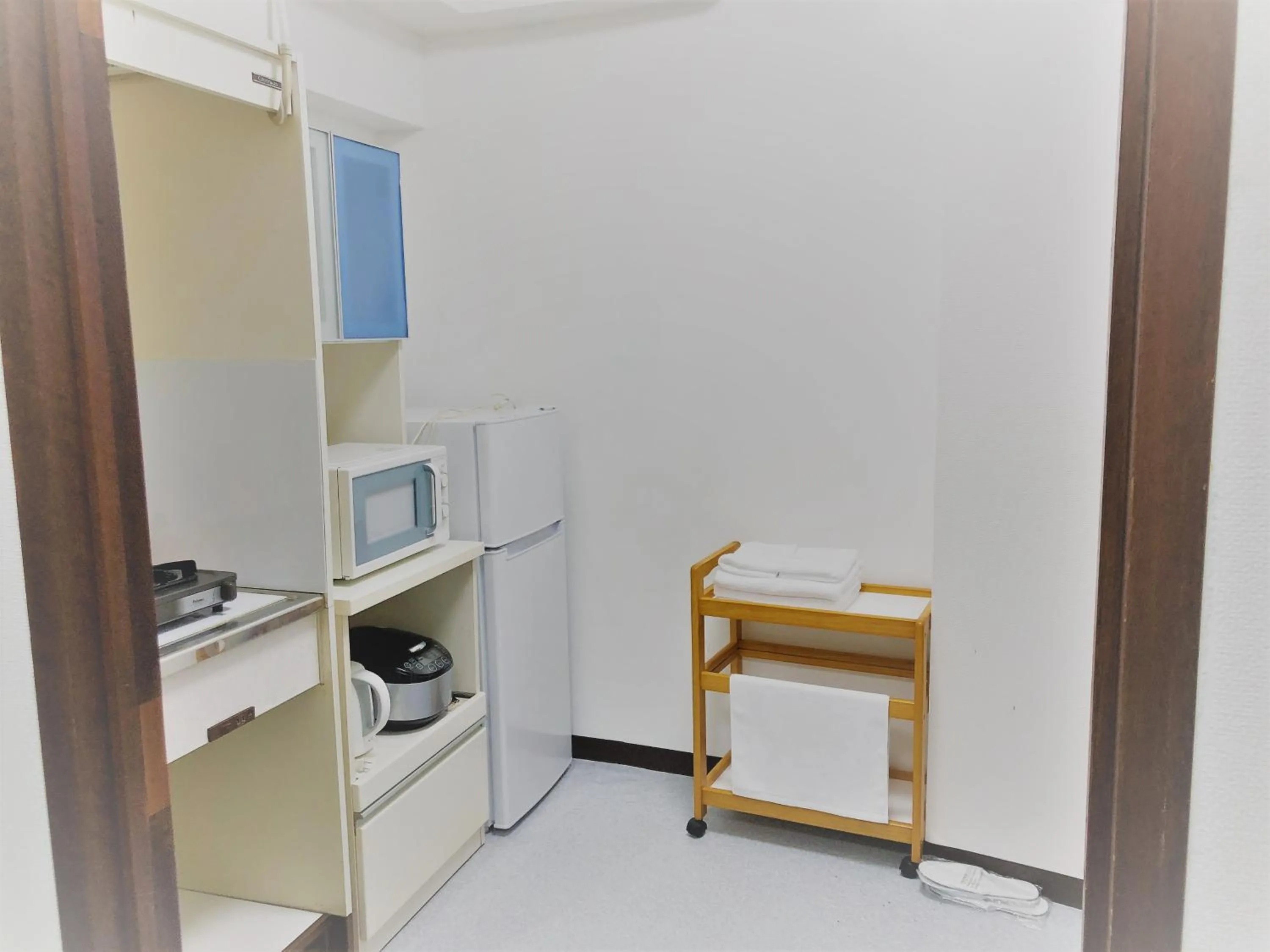 Kitchen or kitchenette in Sunset Hills Inn Naha