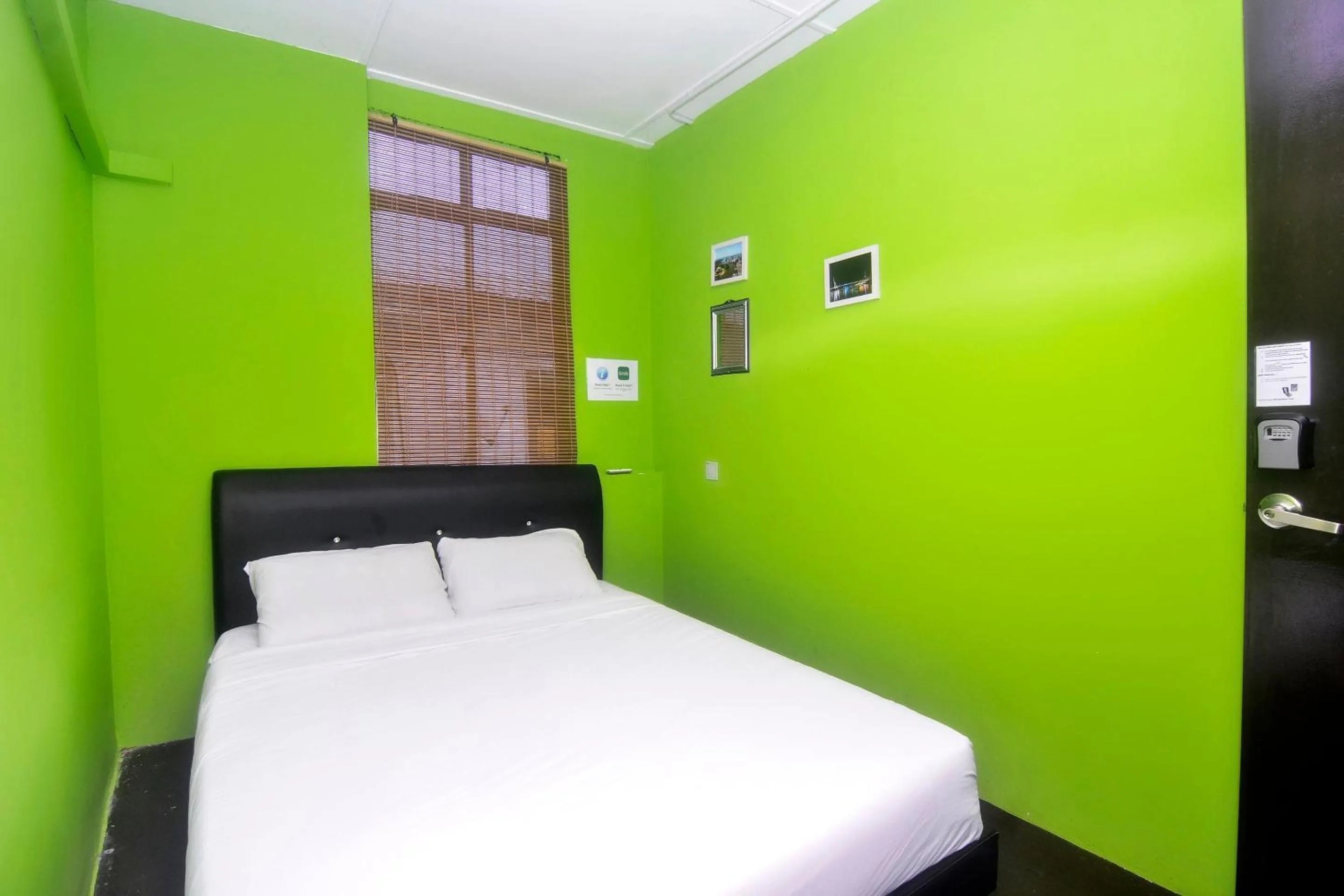 Bedroom in Hotel O Tropical Lodge