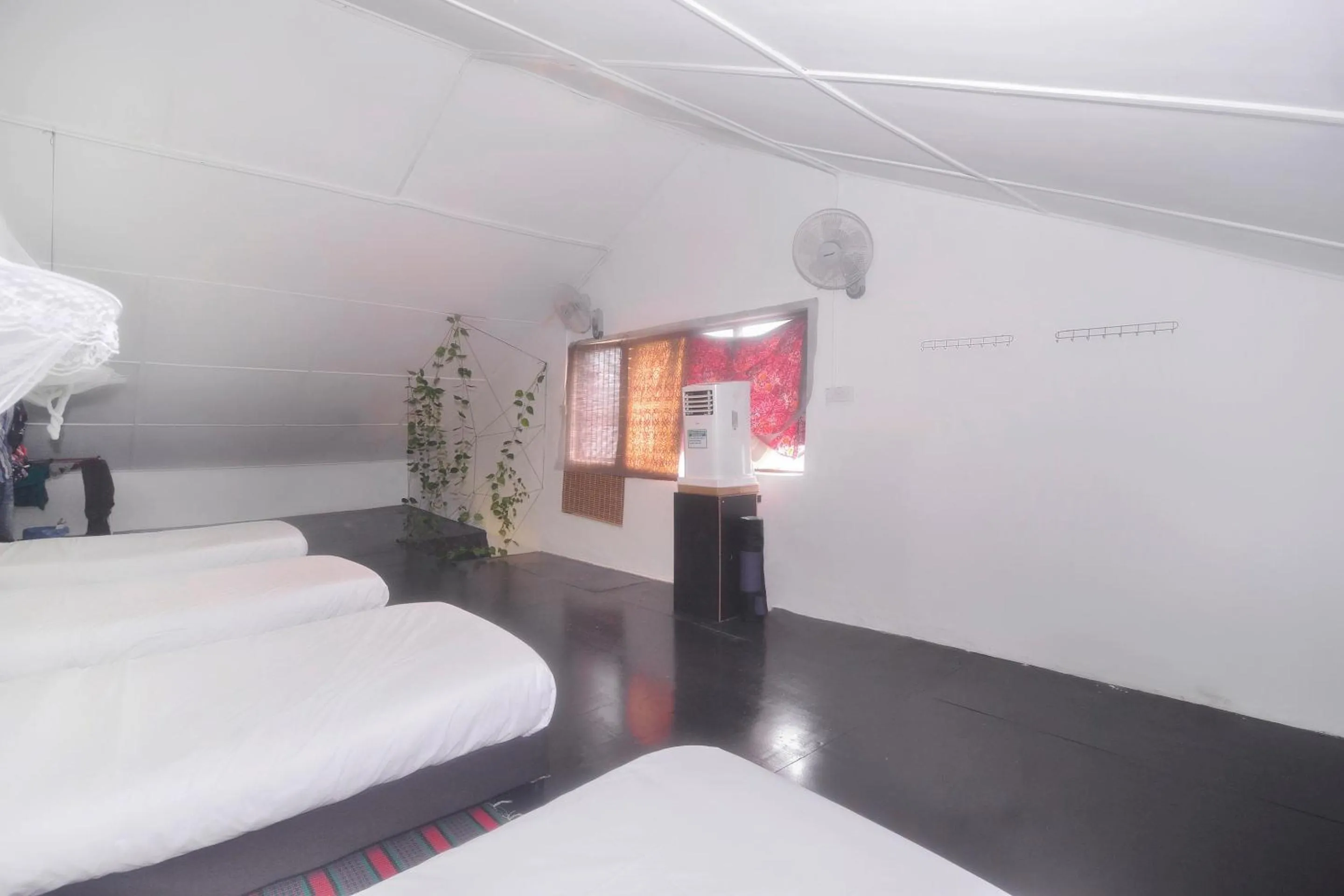 Bedroom in Hotel O Tropical Lodge