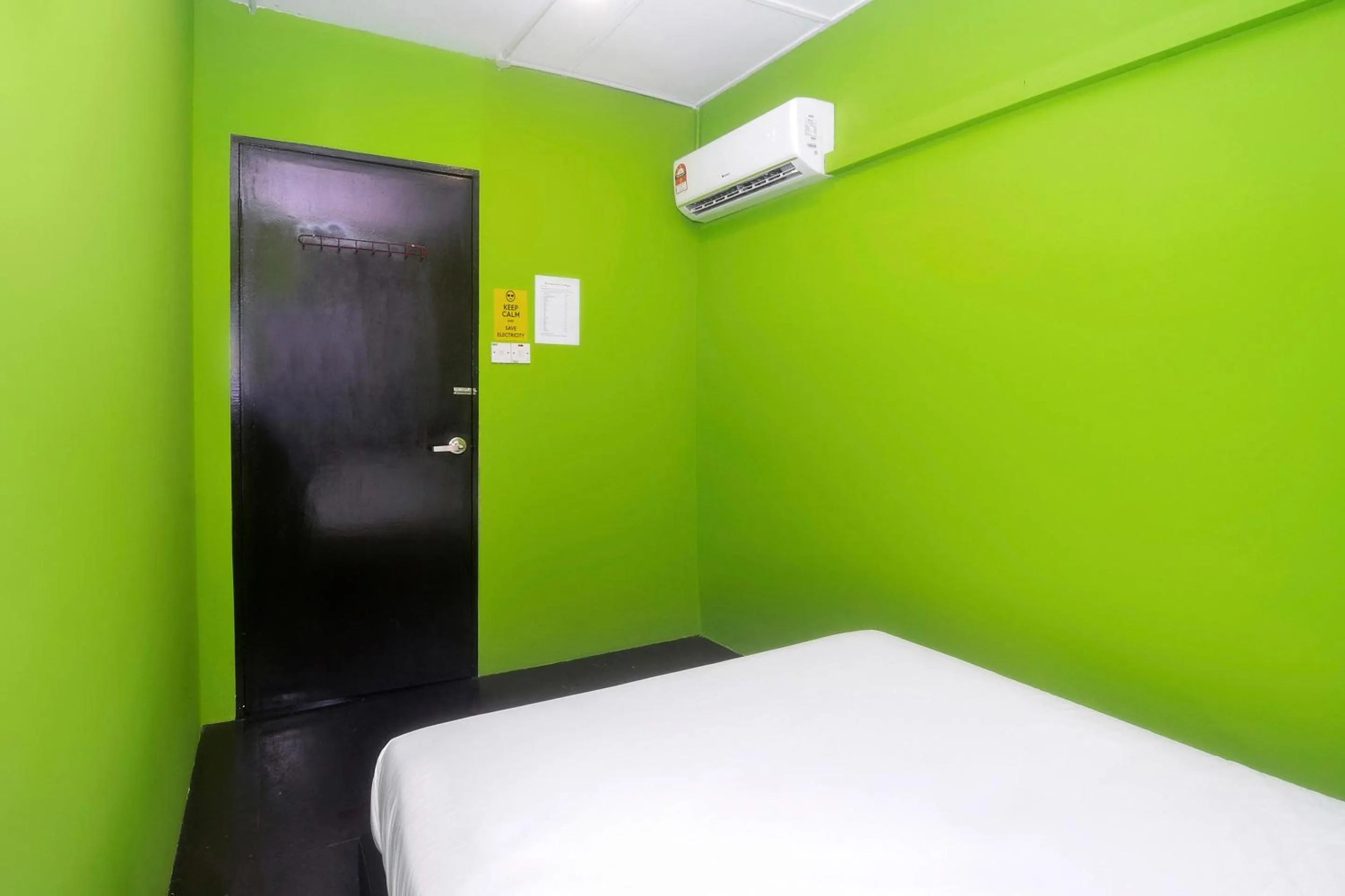 Bedroom in Hotel O Tropical Lodge