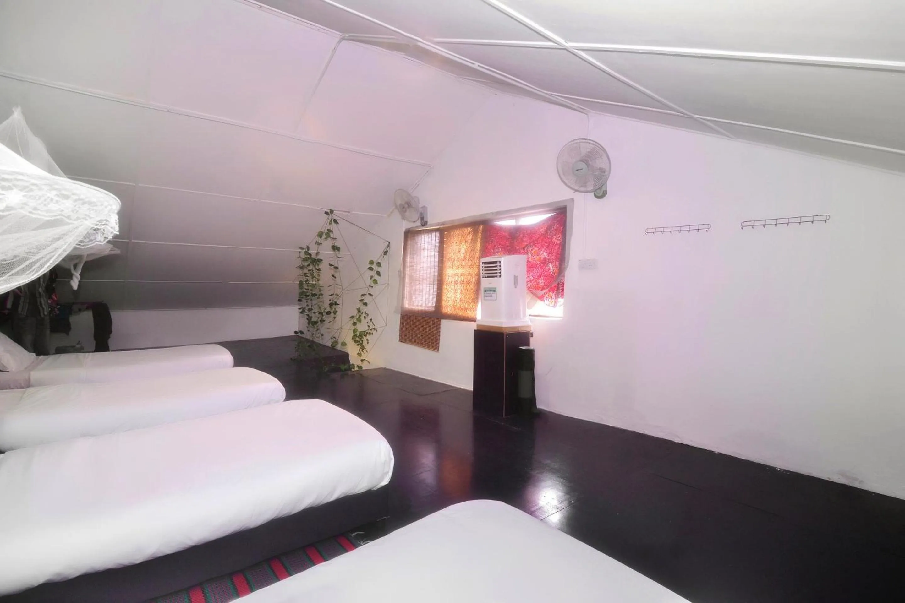 Bedroom in Hotel O Tropical Lodge