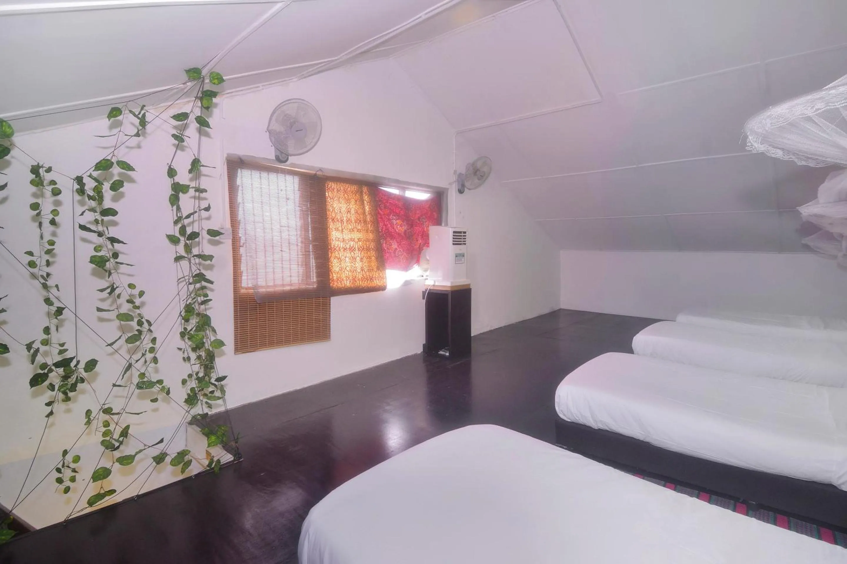 Bedroom in Hotel O Tropical Lodge