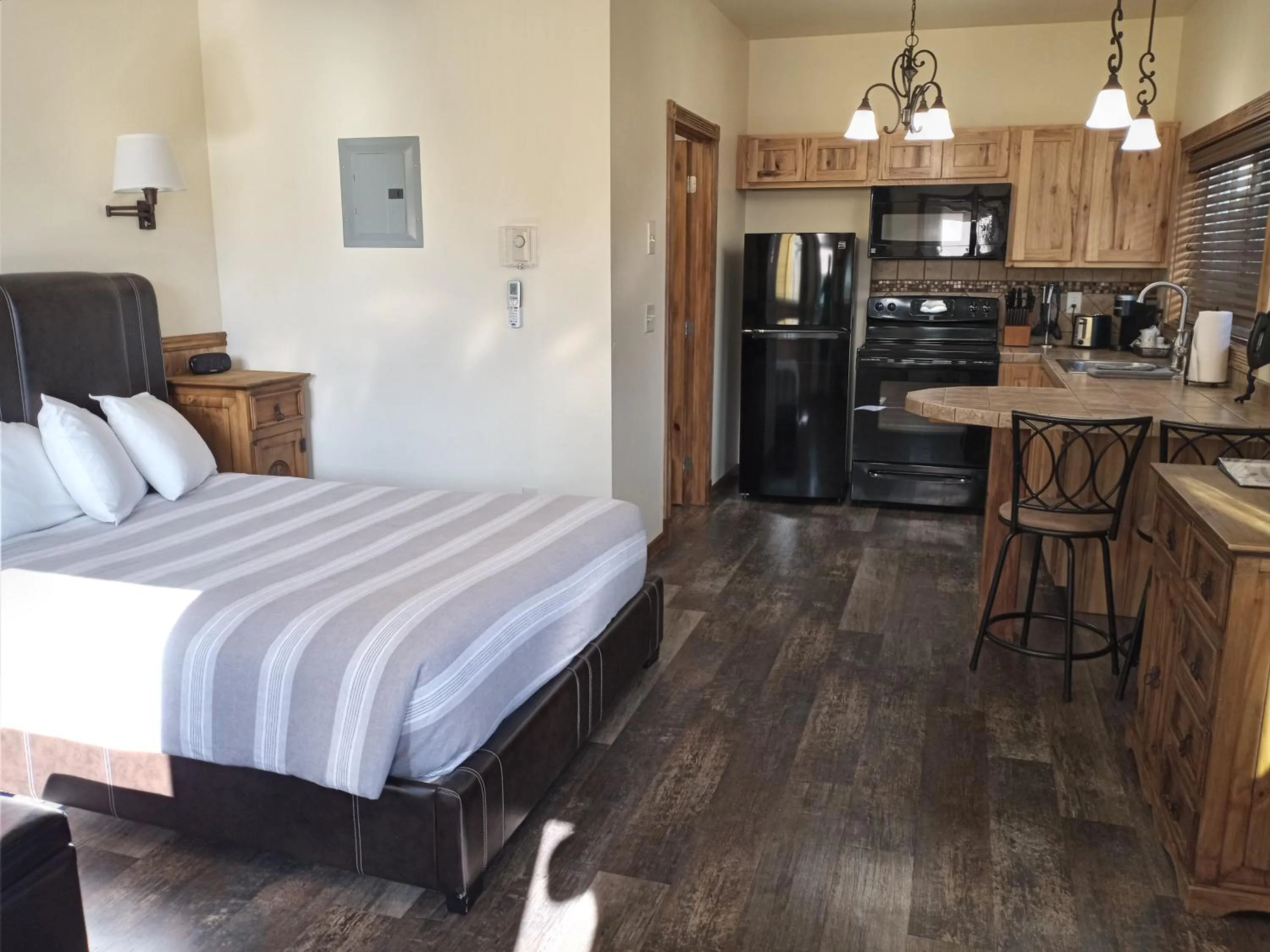 Bed in Yellowstone Riverside Cottages