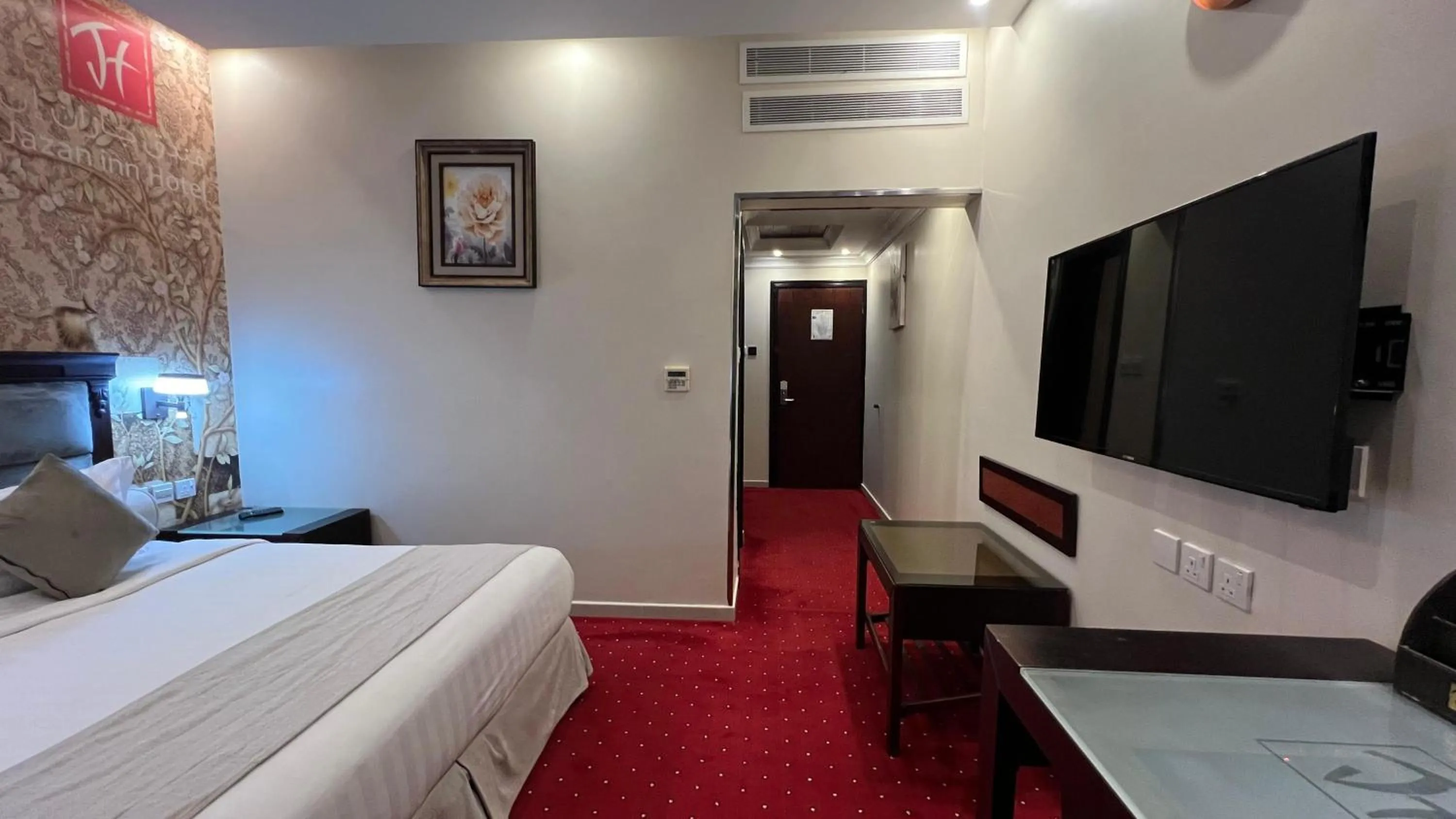 Photo of the whole room, Bed in Jazan Inn Hotel