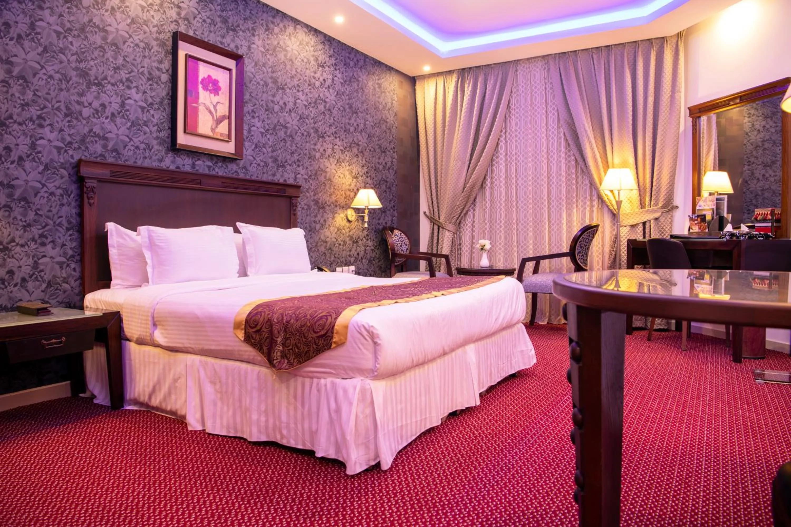 Bed in Jazan Inn Hotel