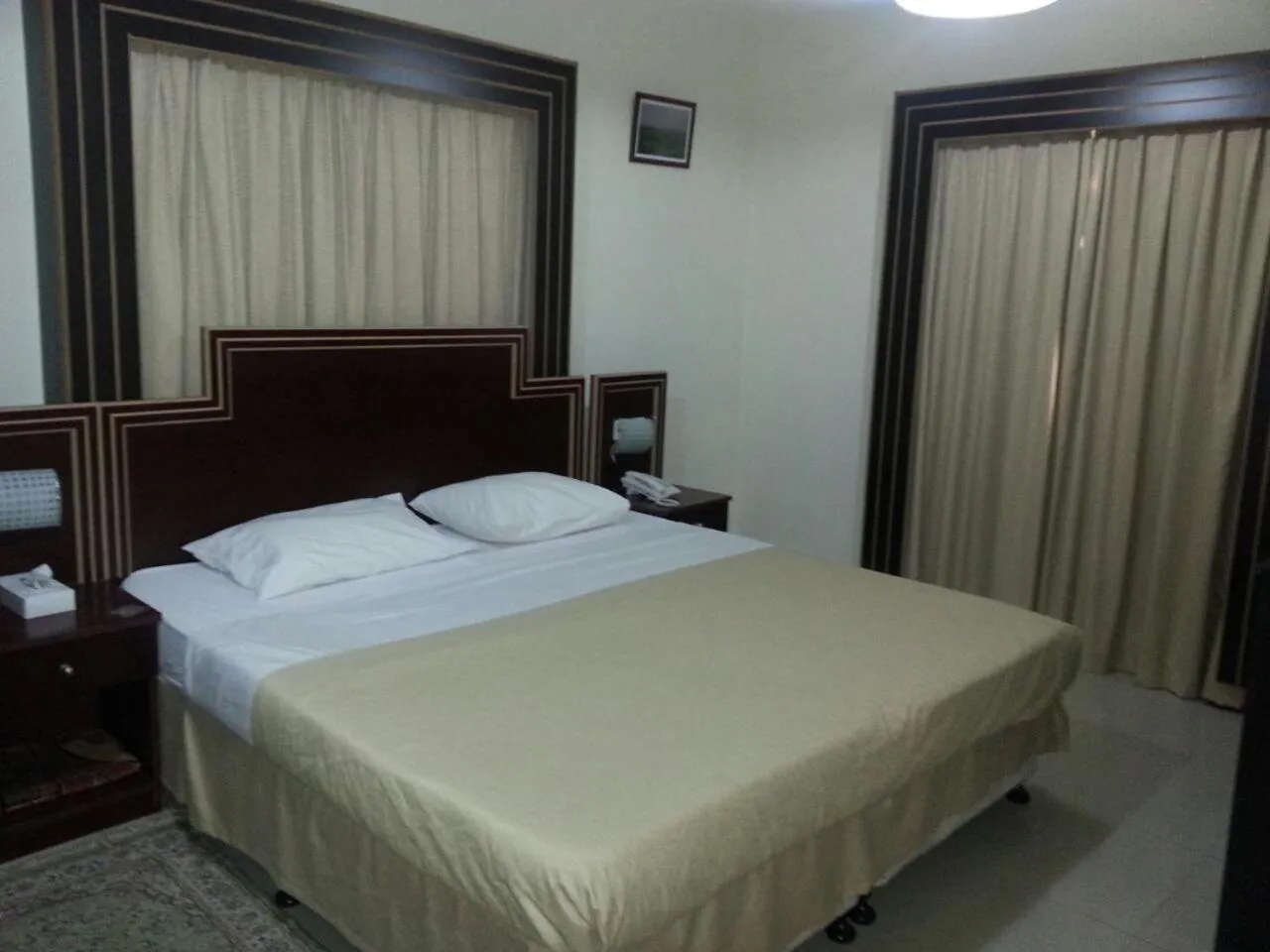 Bed in Dolphin Hotel
