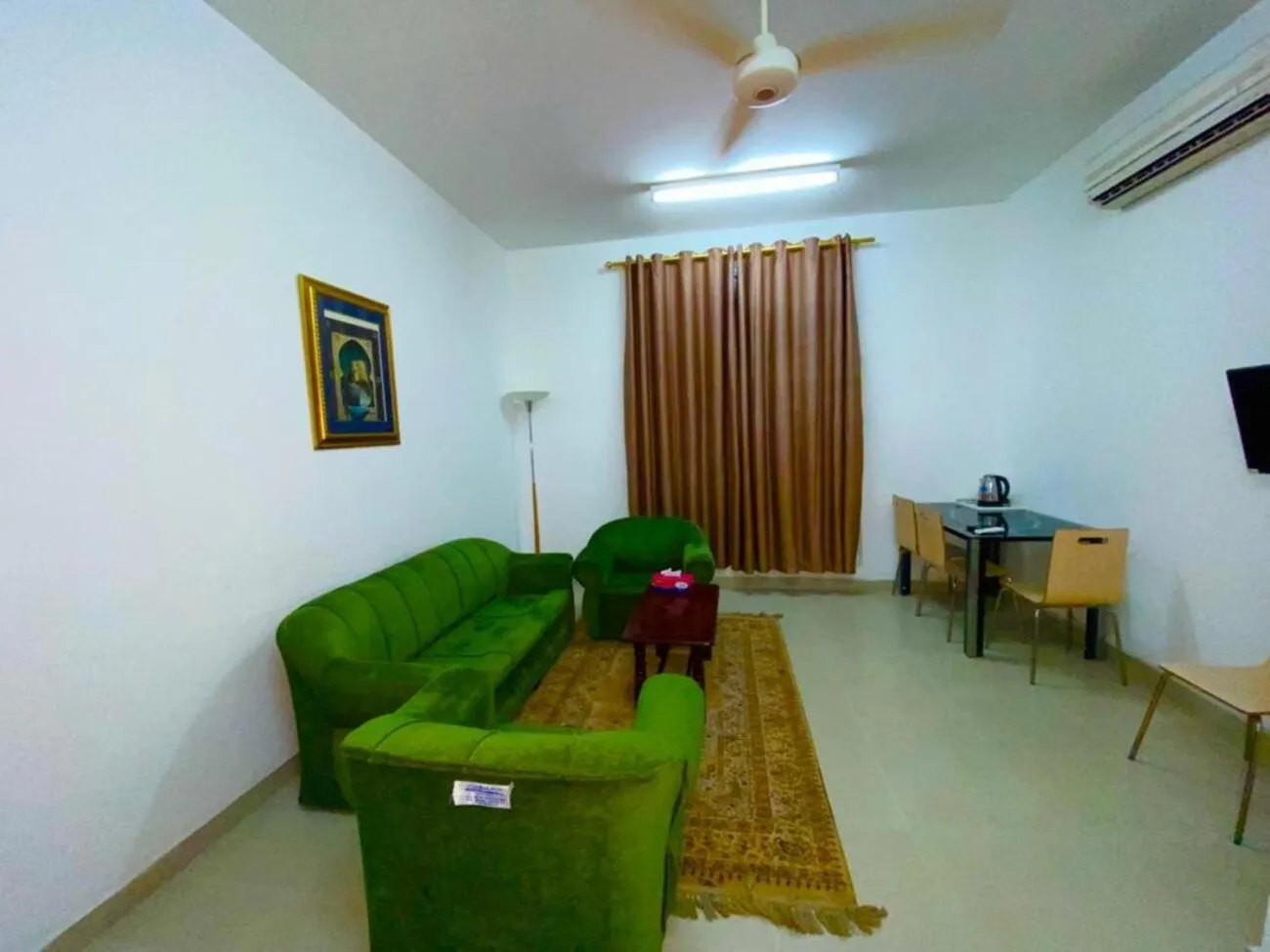 Living room in Savoy Inn Hotel Apartments