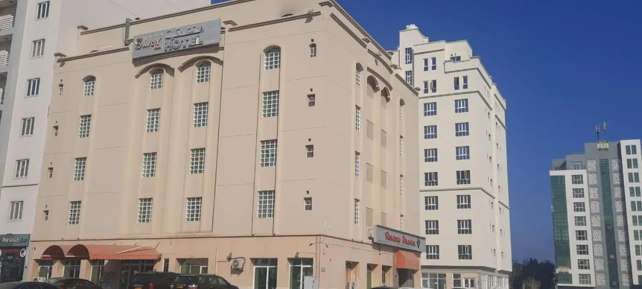 Property building in Savoy Inn Hotel Apartments