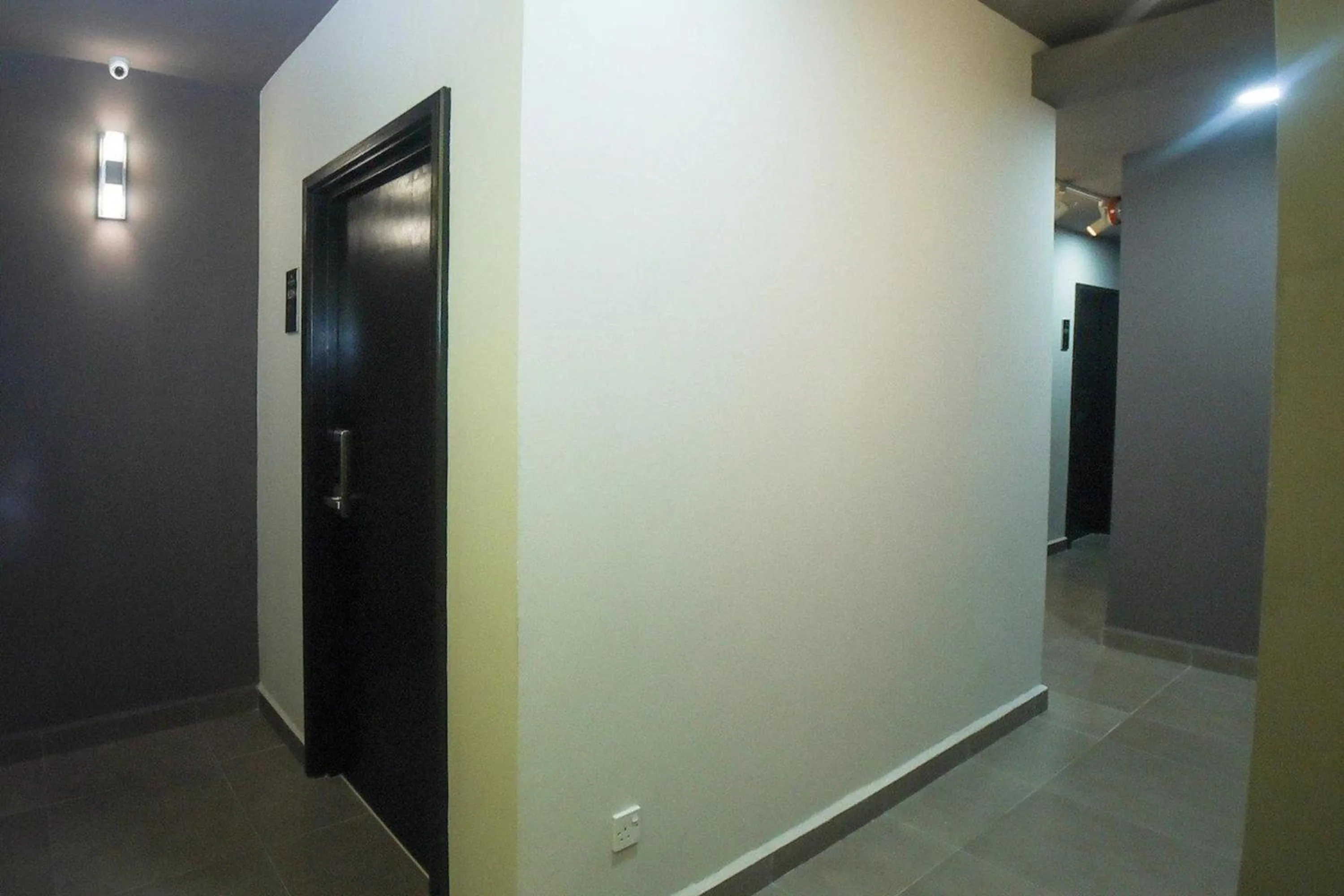 wardrobe in Hotel O La Mirina Boutique Inn