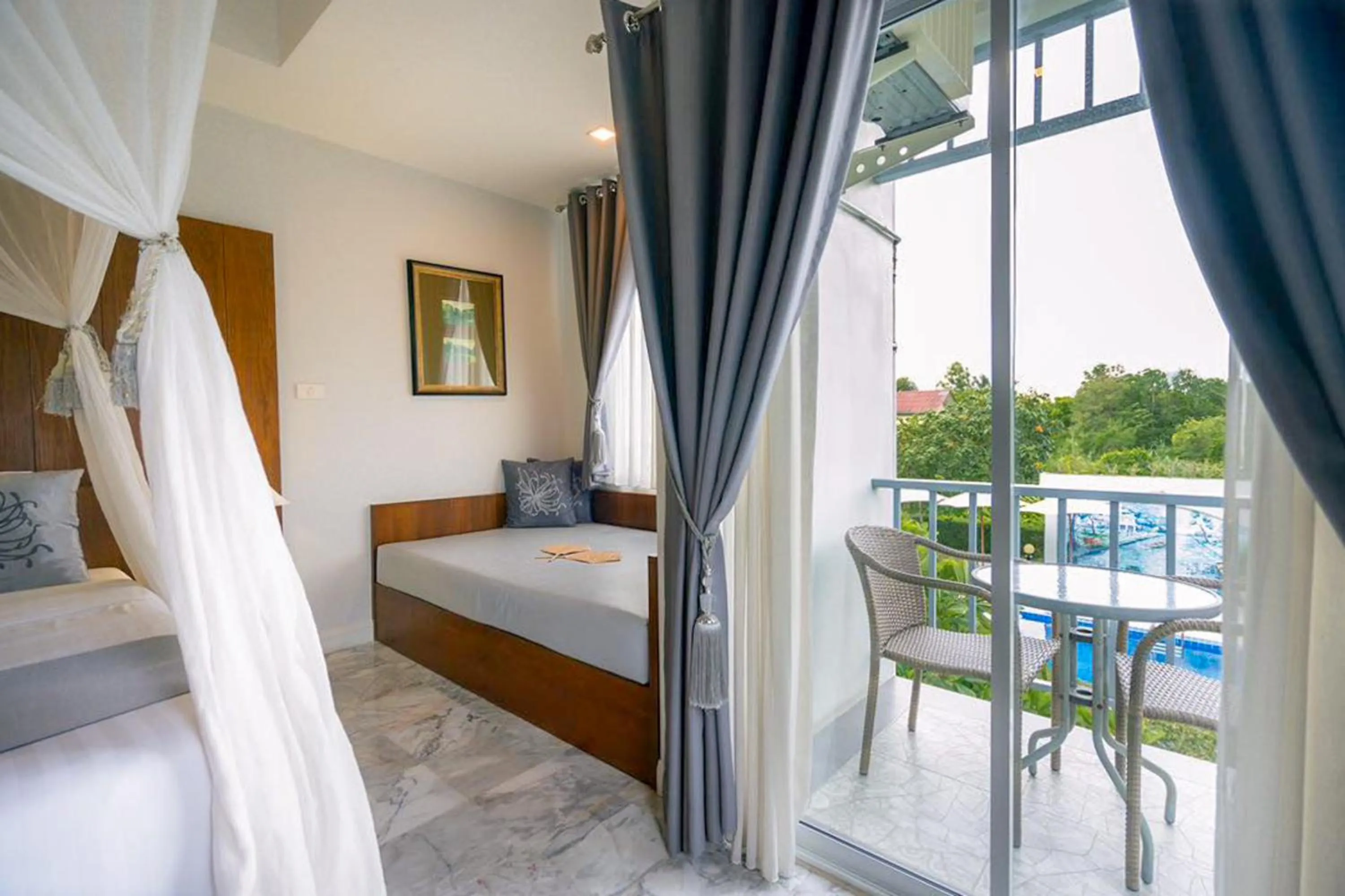Pool view, Bed in Villa Amphawa