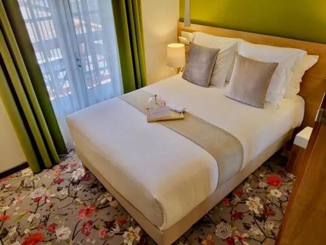 Bed in Hôtel Berria par La Maison de Pierre