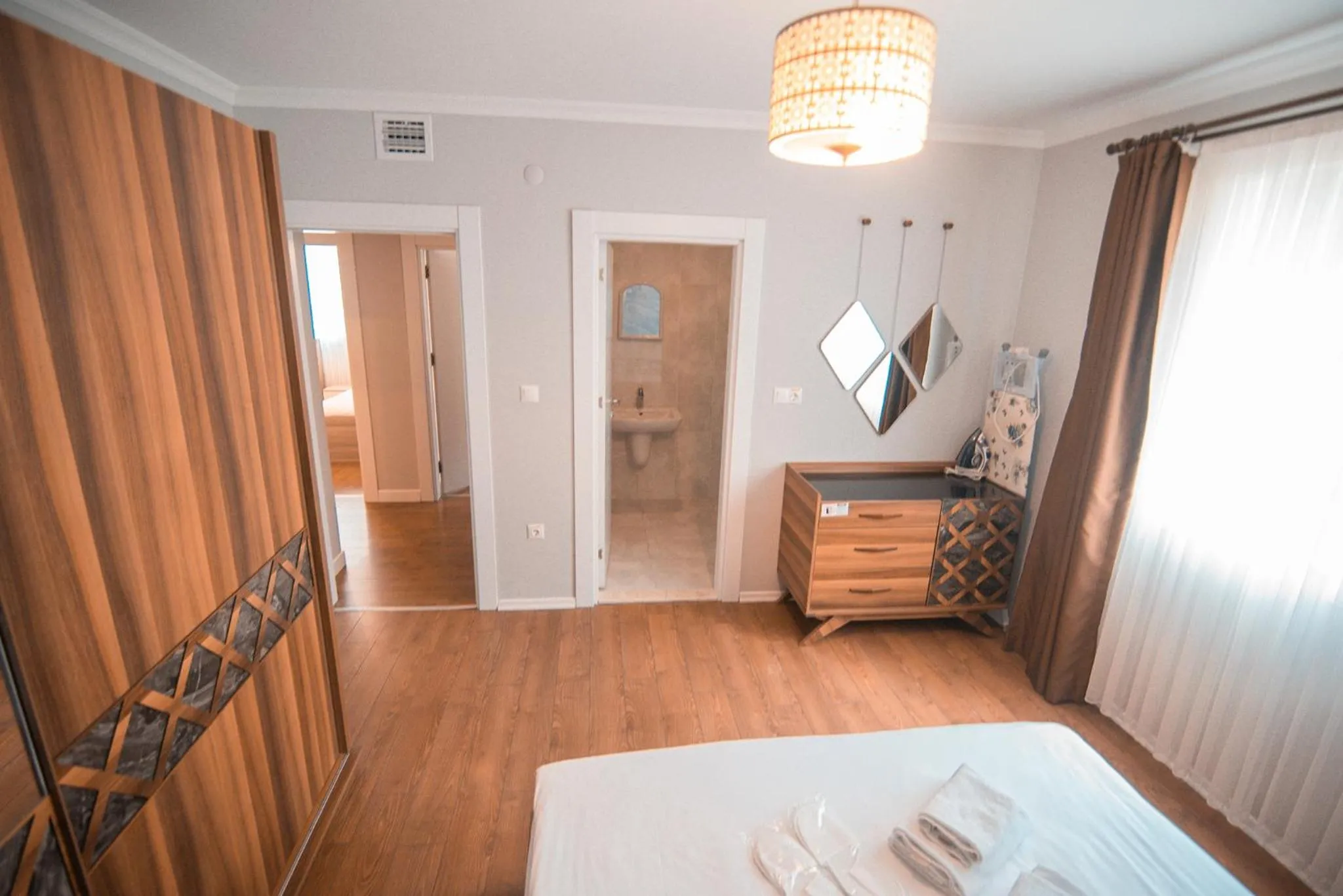 Bed in Royal Comfort Hotel