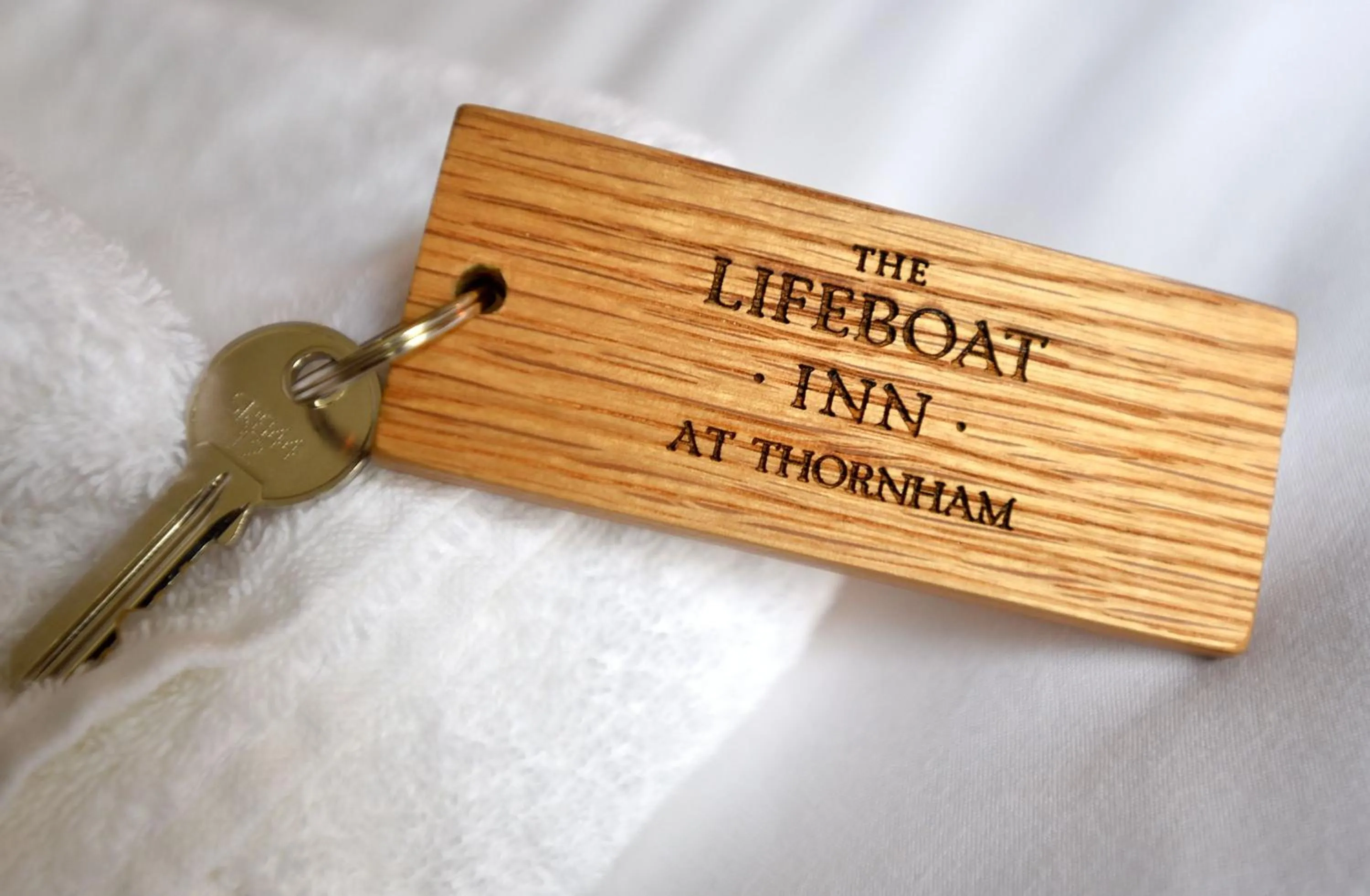 Logo/Certificate/Sign in The Lifeboat Inn