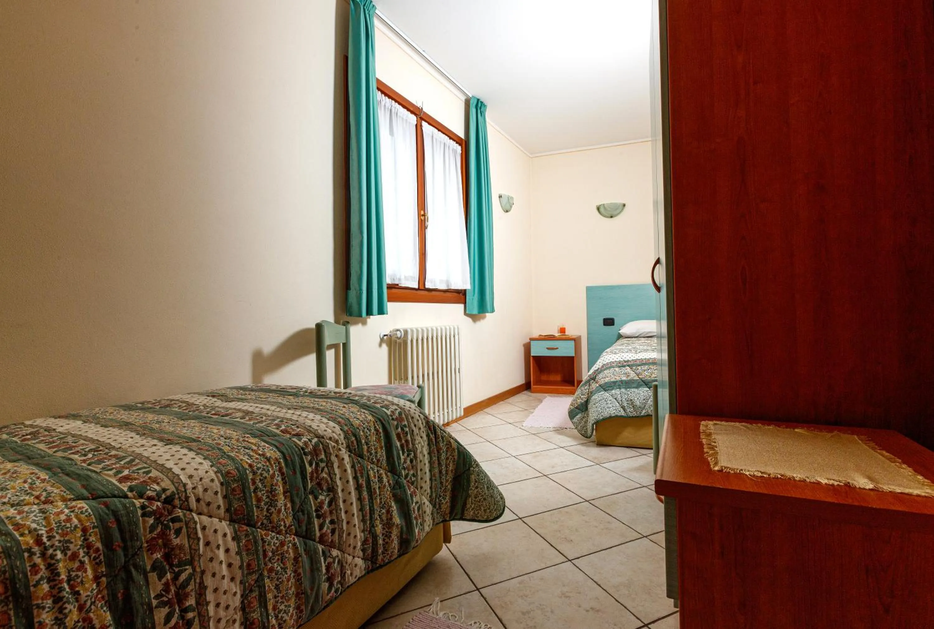 Bed in Hotel Villa Rina