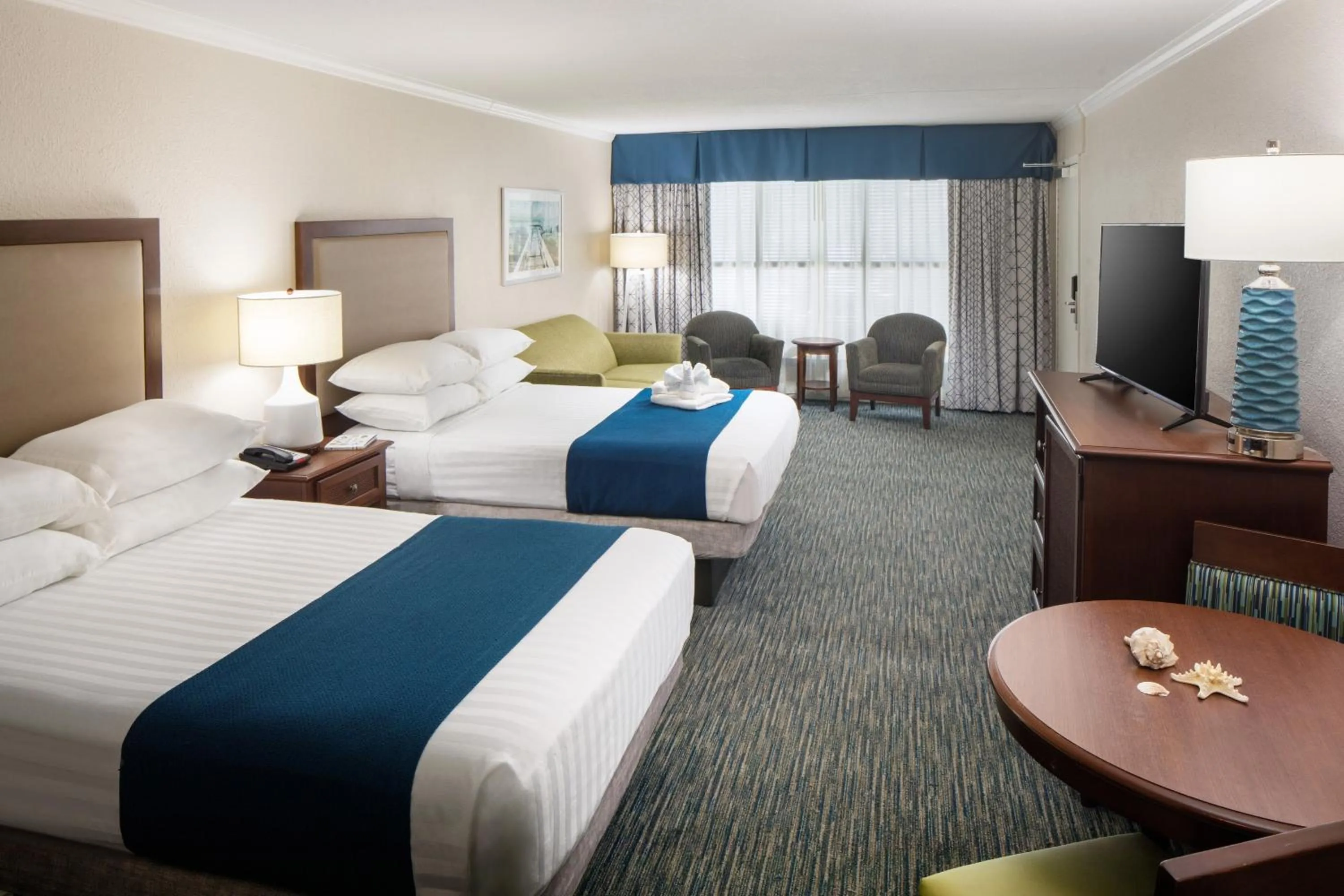 Bed in Sea Crest Oceanfront Resort