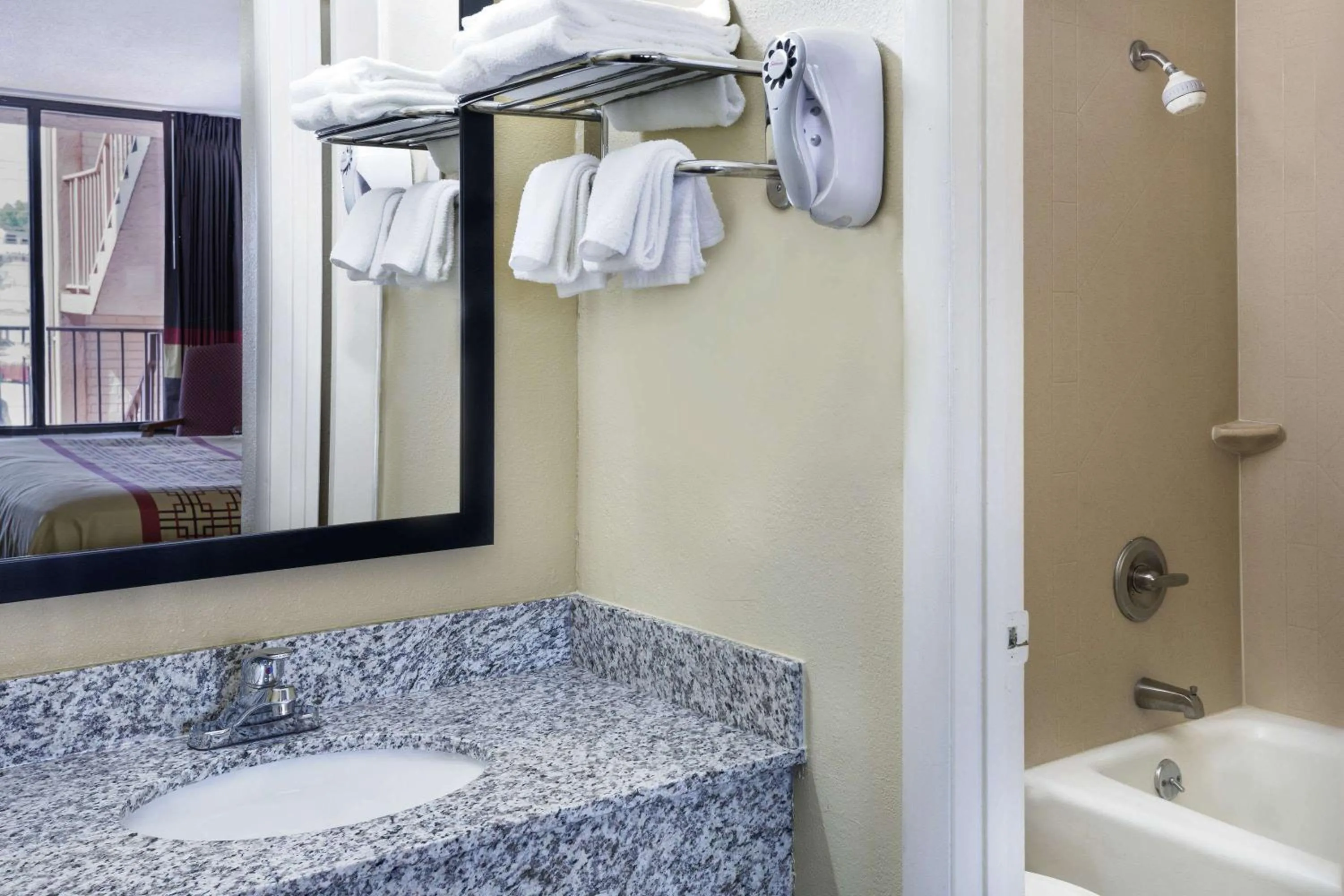 Bathroom in Days Inn by Wyndham Columbus-North Fort Moore