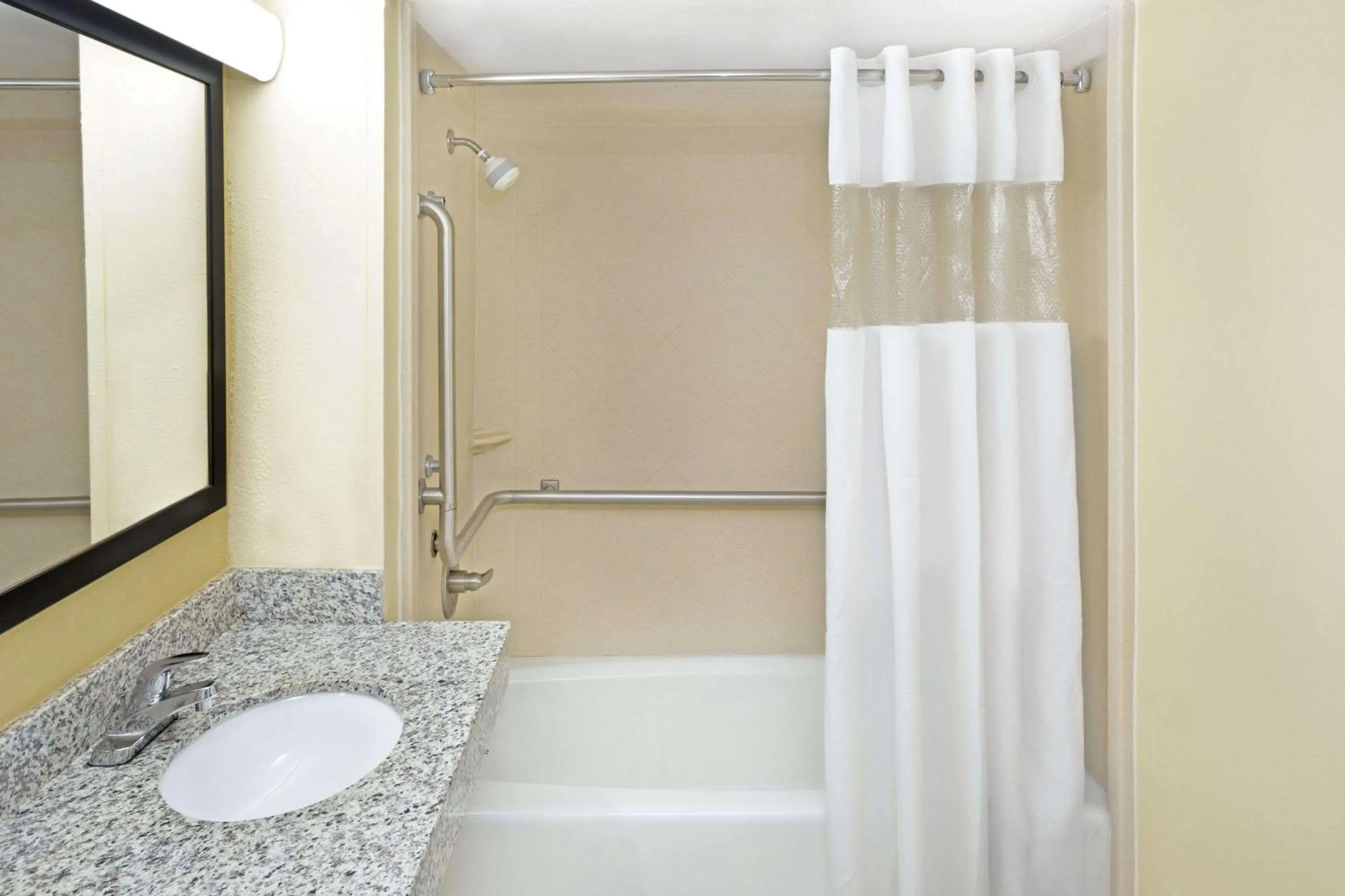 Bathroom in Days Inn by Wyndham Columbus-North Fort Moore