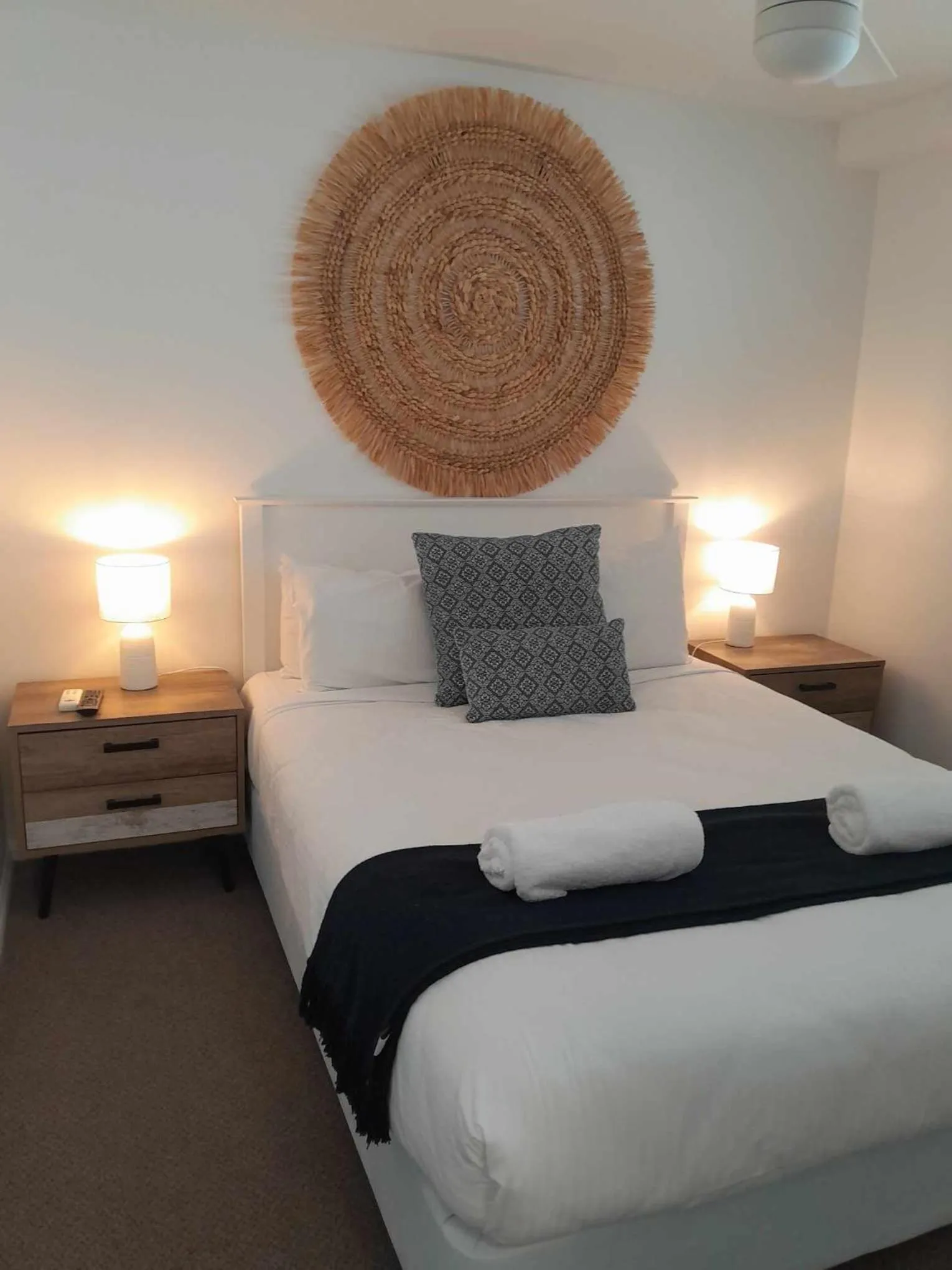 Bed in Grand Palais Boolarong Beachside Apartments