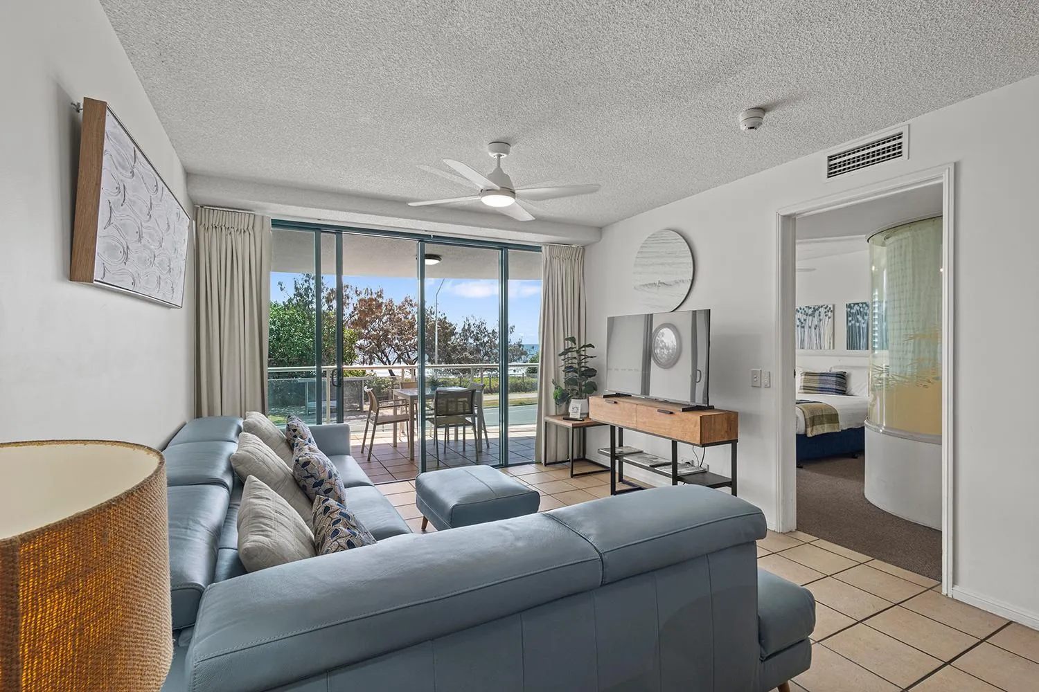 Bed in Grand Palais Boolarong Beachside Apartments