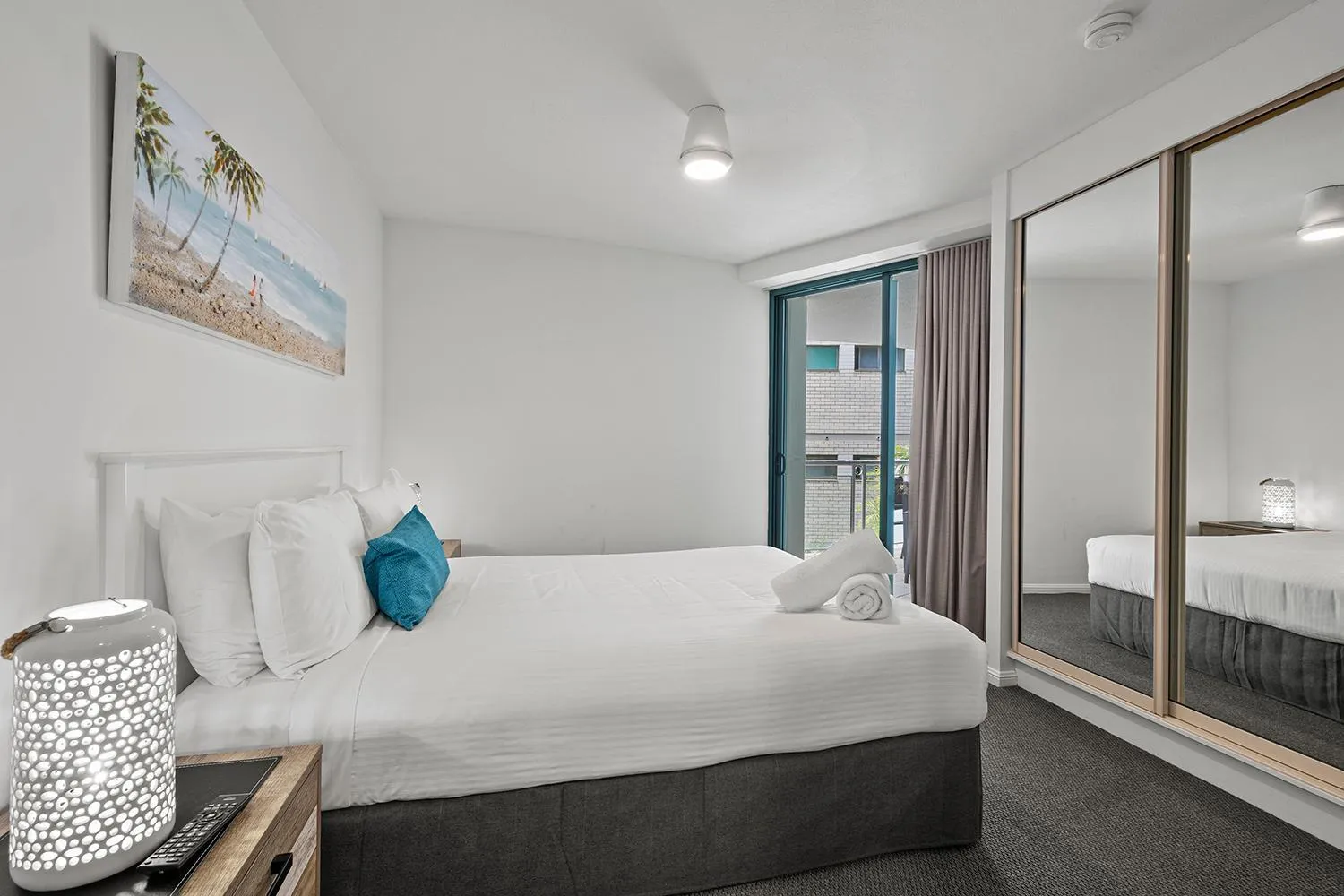 Bed in Grand Palais Boolarong Beachside Apartments