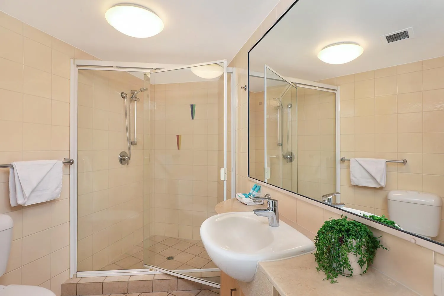 Shower in Grand Palais Boolarong Beachside Apartments