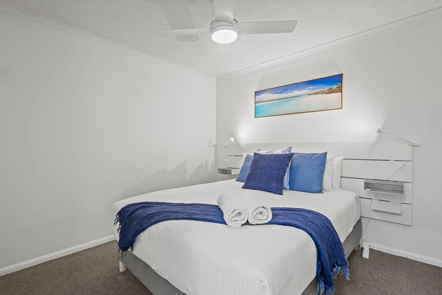 Bed in Grand Palais Boolarong Beachside Apartments