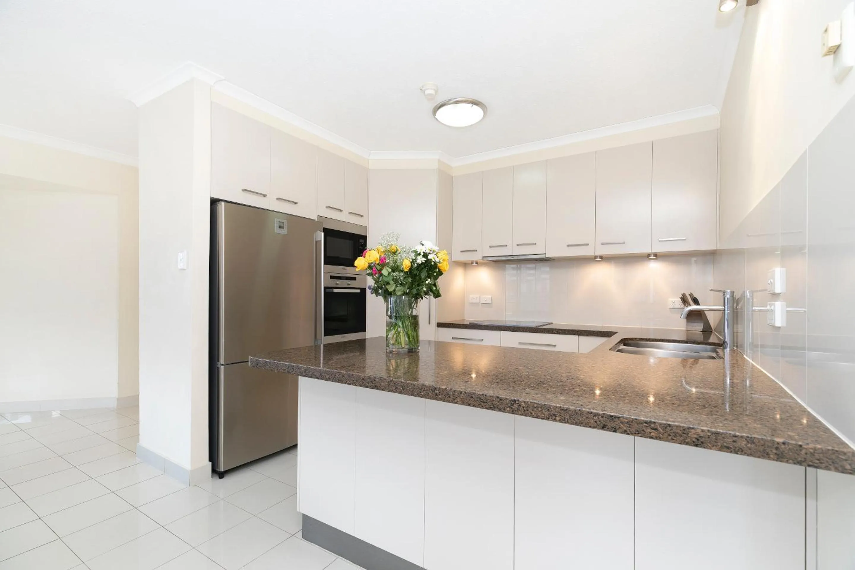 Kitchen or kitchenette in The Astor Apartments