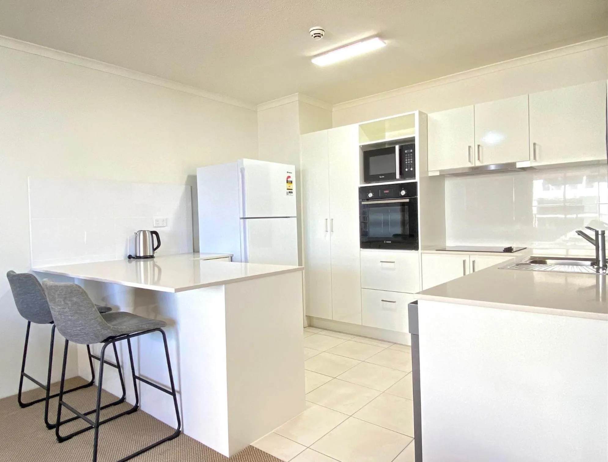 Kitchen or kitchenette in The Astor Apartments