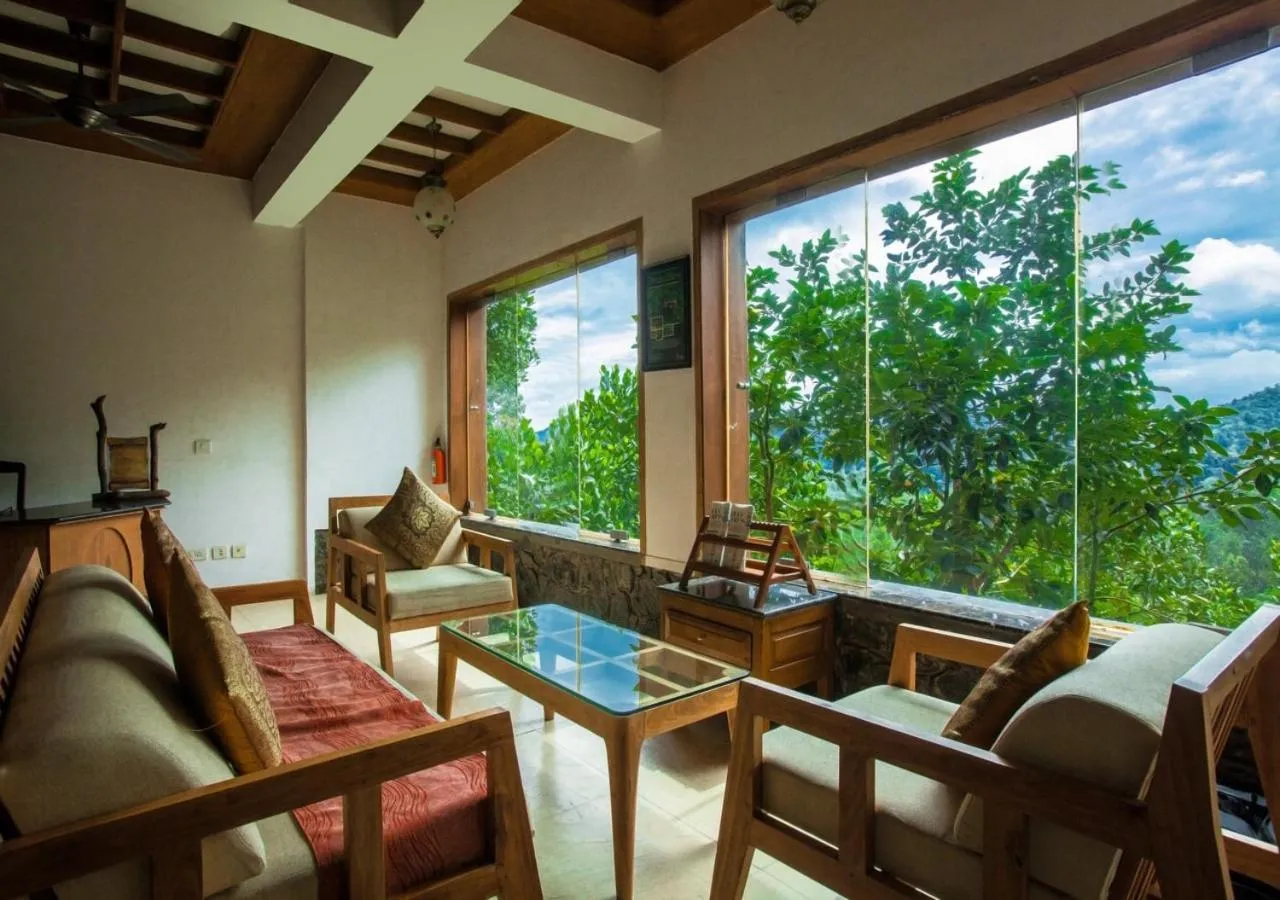 Communal lounge/ TV room in Oxygen Resorts Thekkady