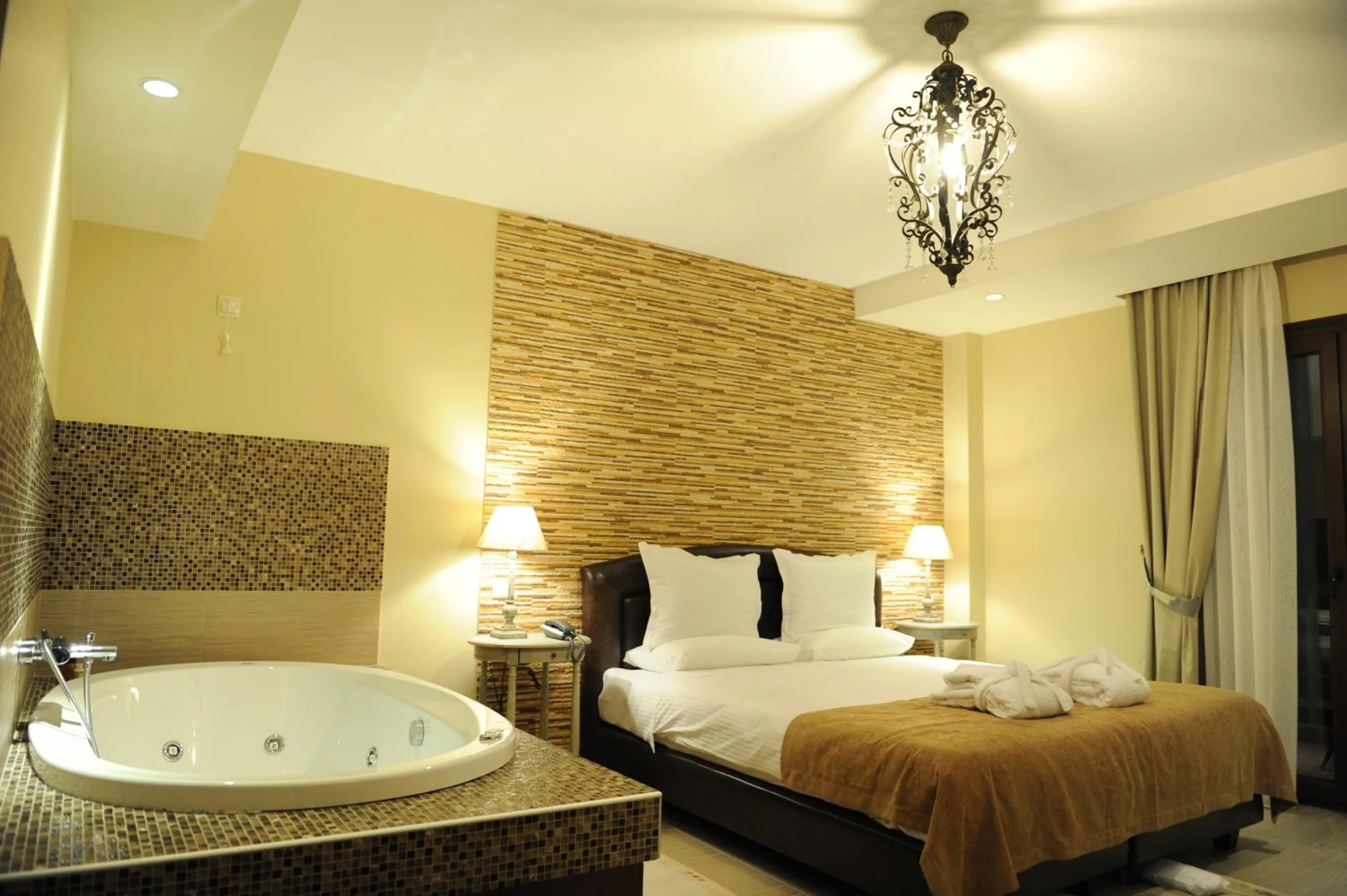 Photo of the whole room, Bed in Agapi Luxury Hotel