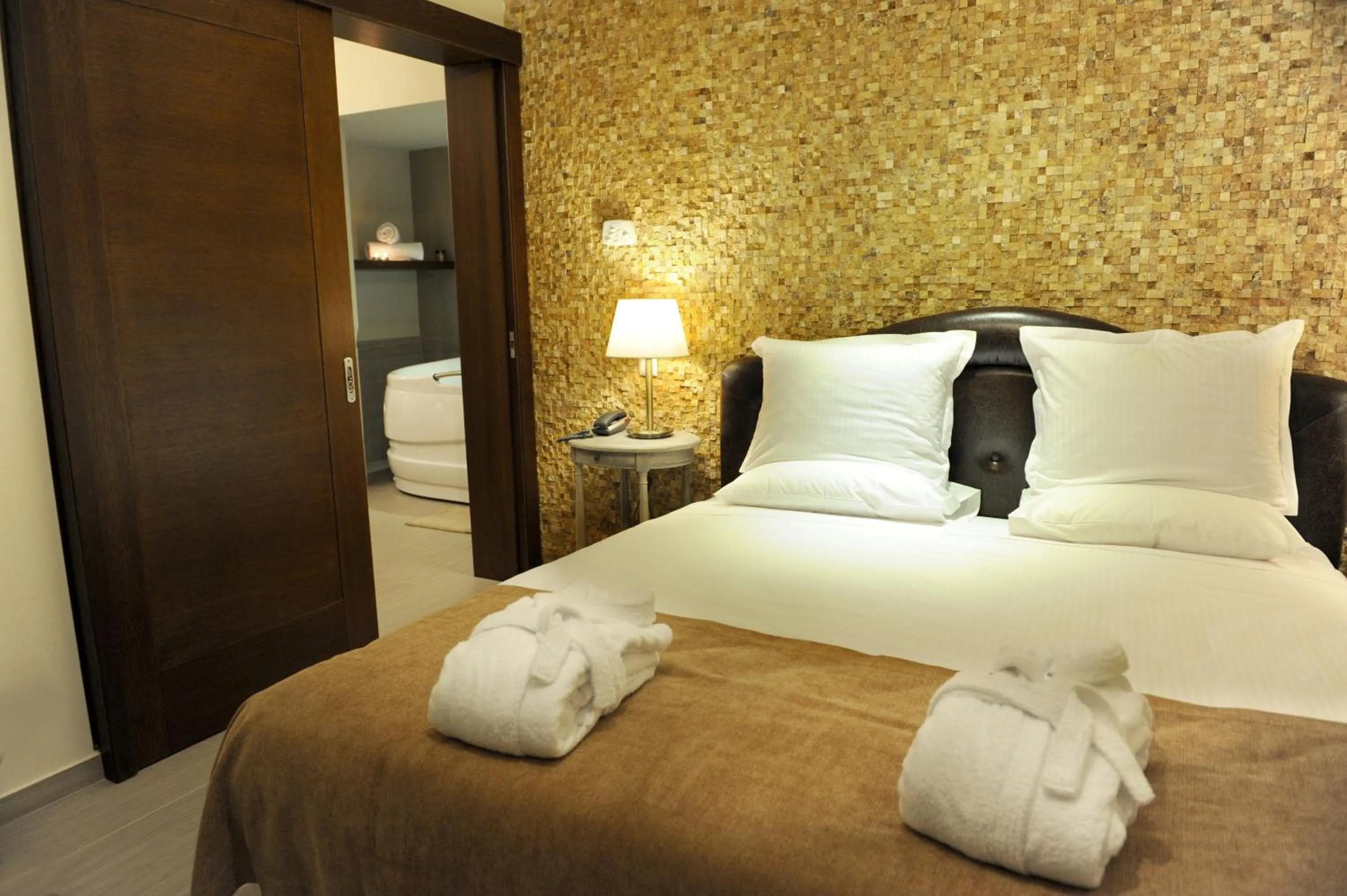 Bed in Agapi Luxury Hotel