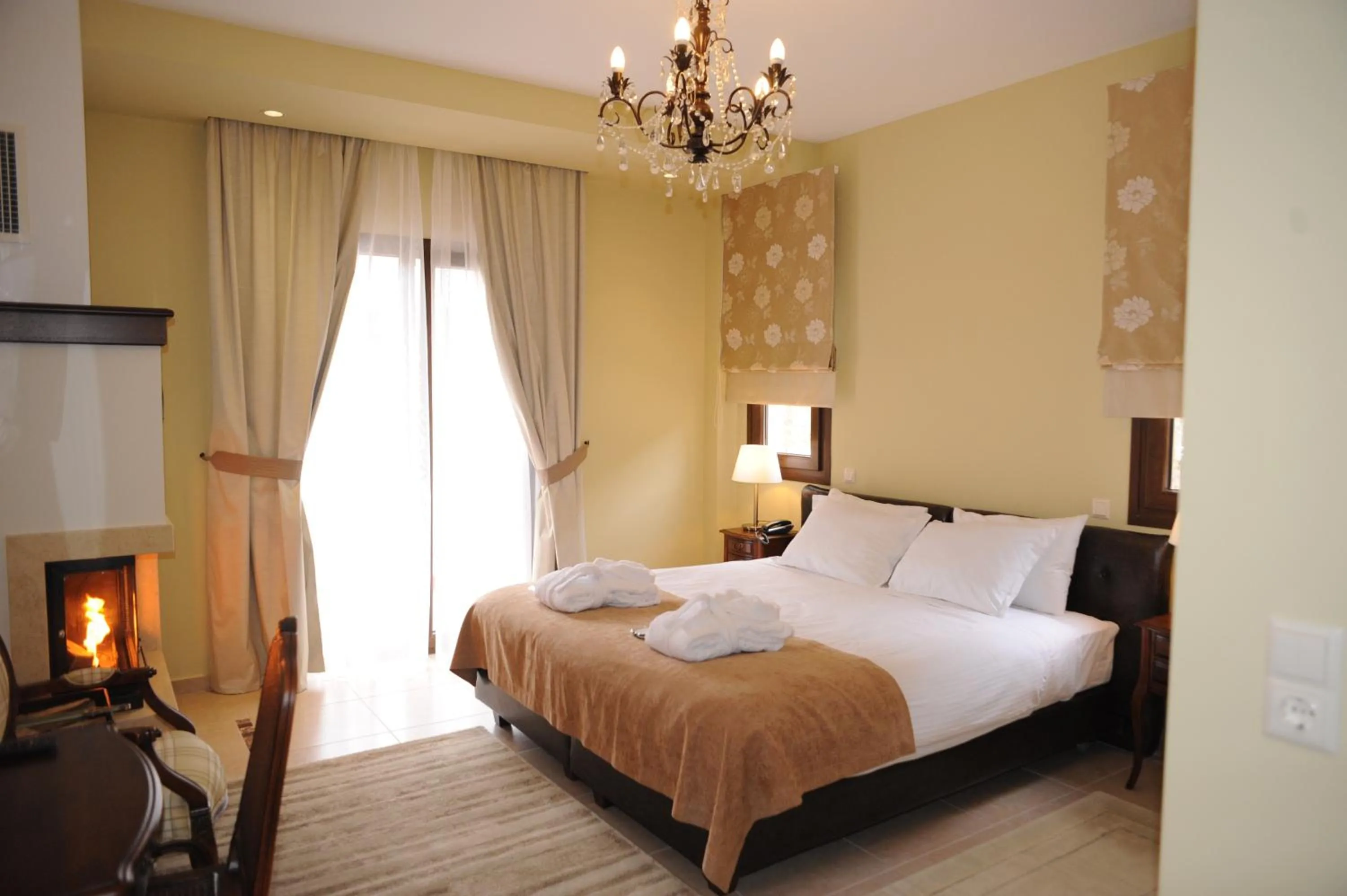 Bed in Agapi Luxury Hotel