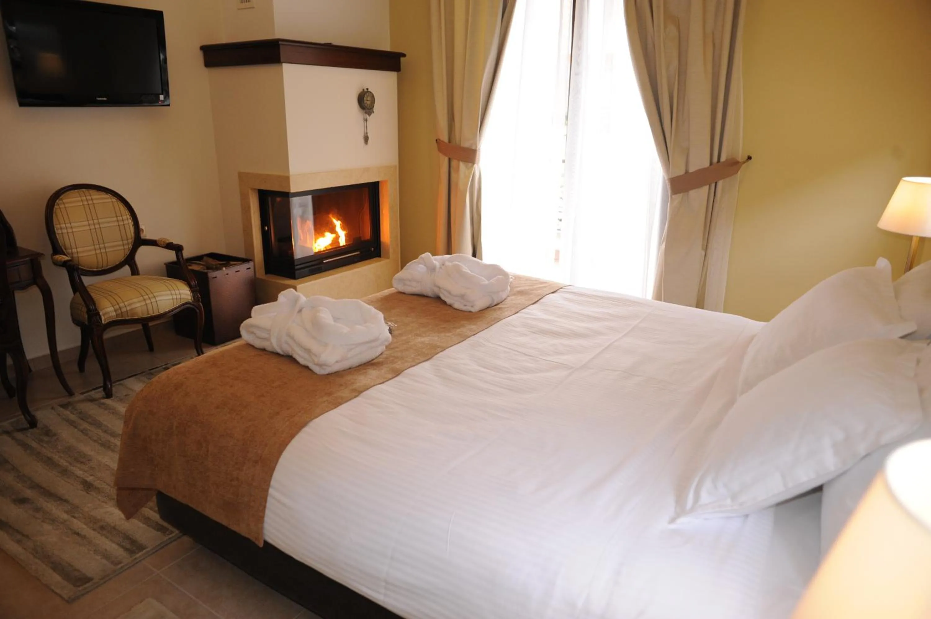 Bed in Agapi Luxury Hotel