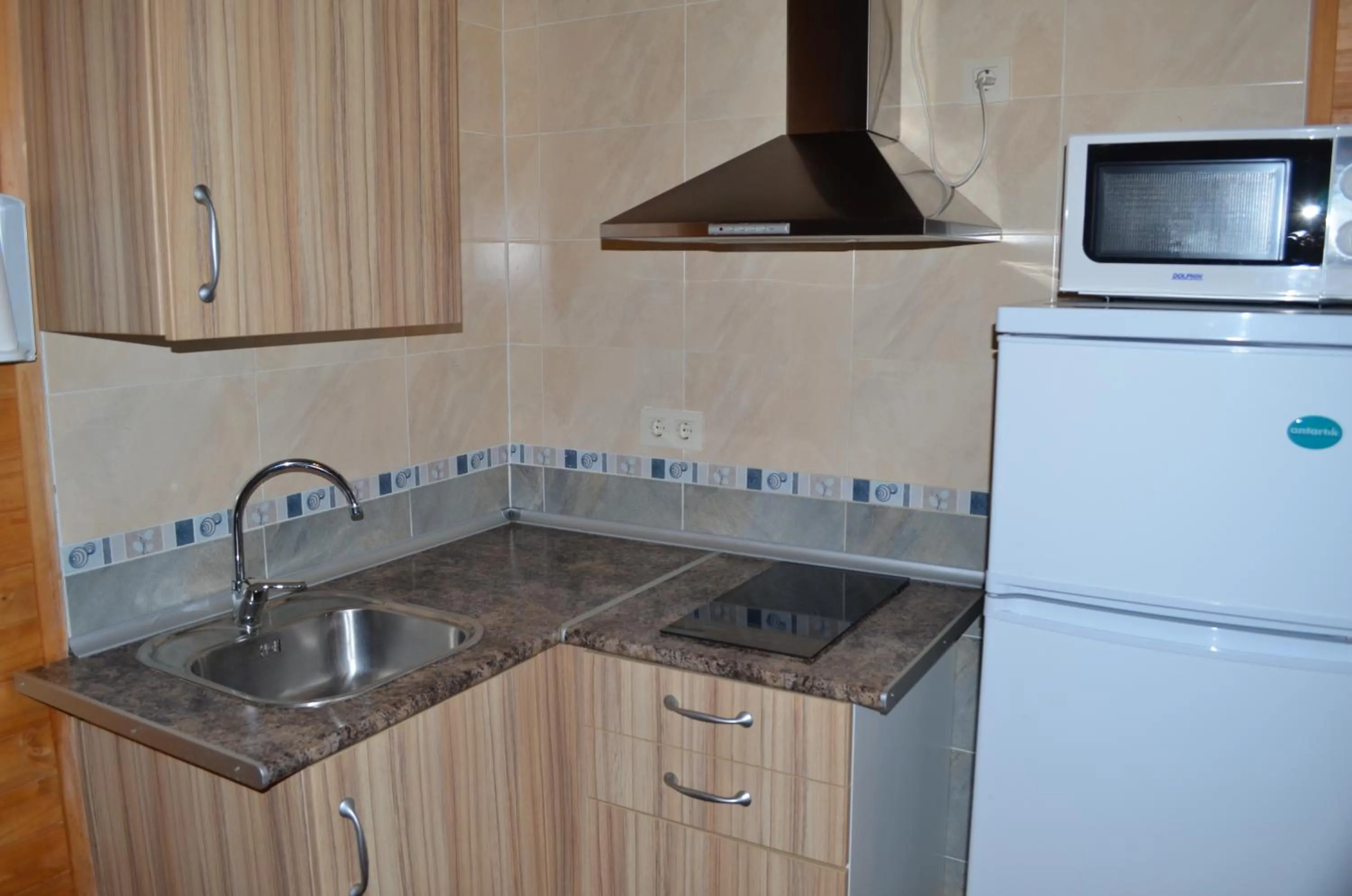 Kitchen or kitchenette in Apartamentos Paraje San Gines