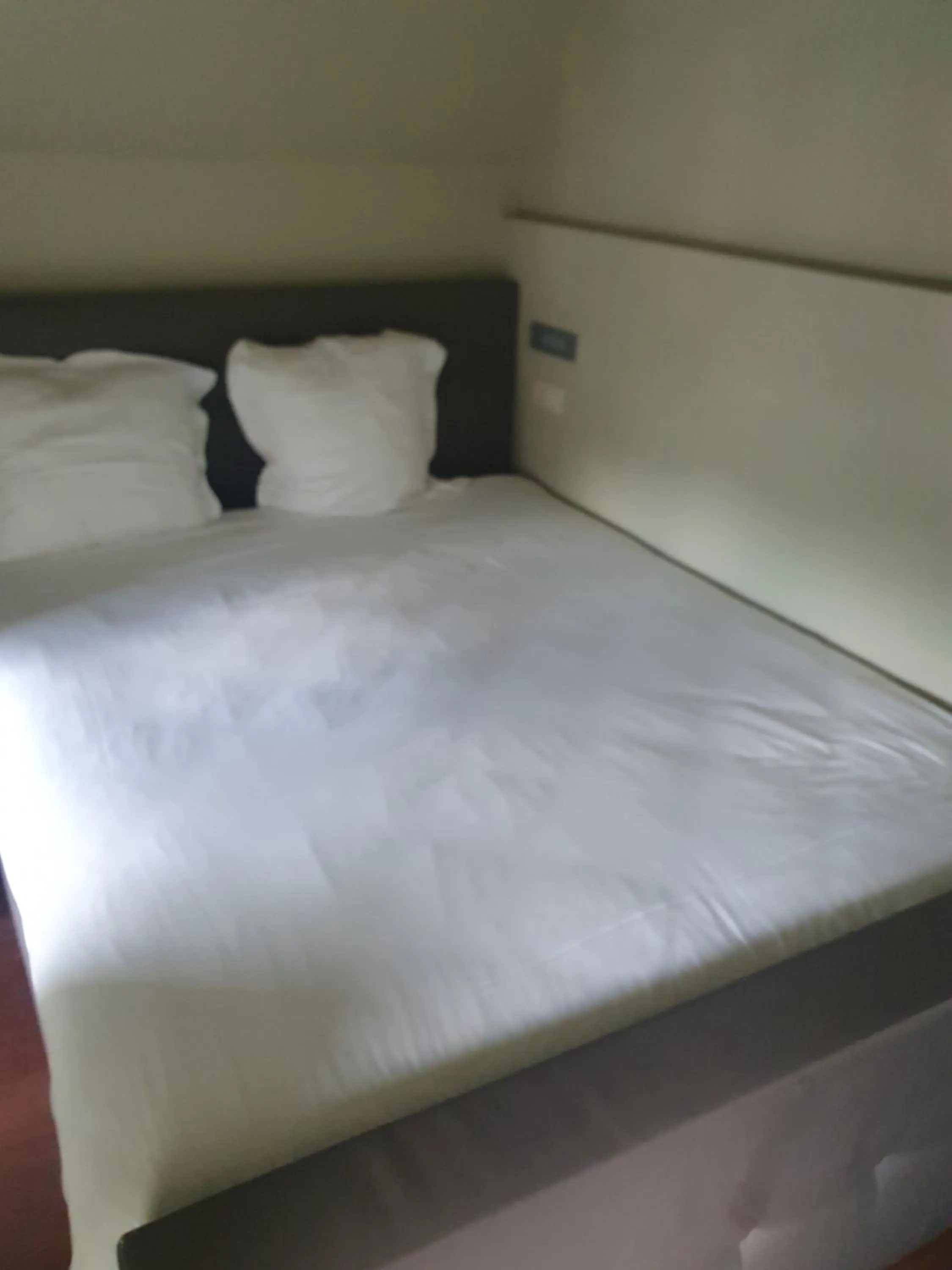 Bed in La Merveilleuse by Infiniti hôtel